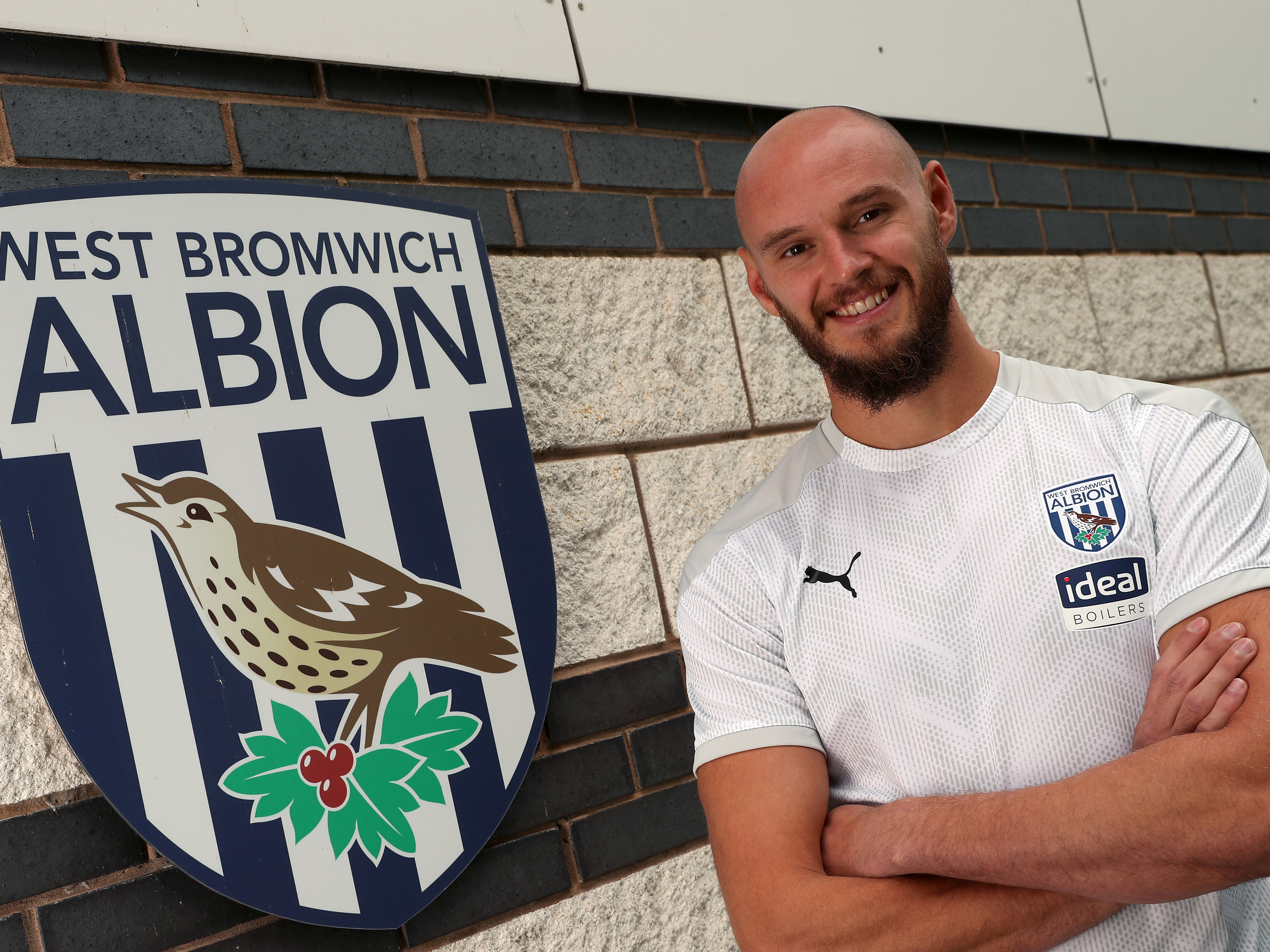 David Button signs