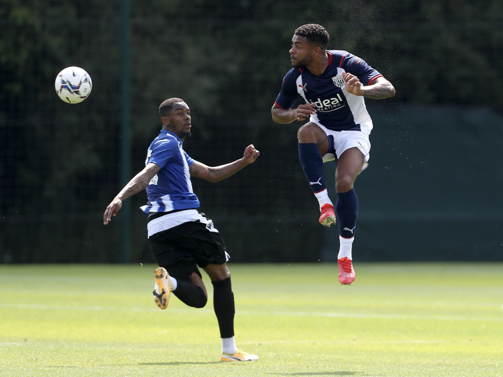 Darnell Furlong heads the ball during the Baggies' friendly victory against Sheffield Wednesday