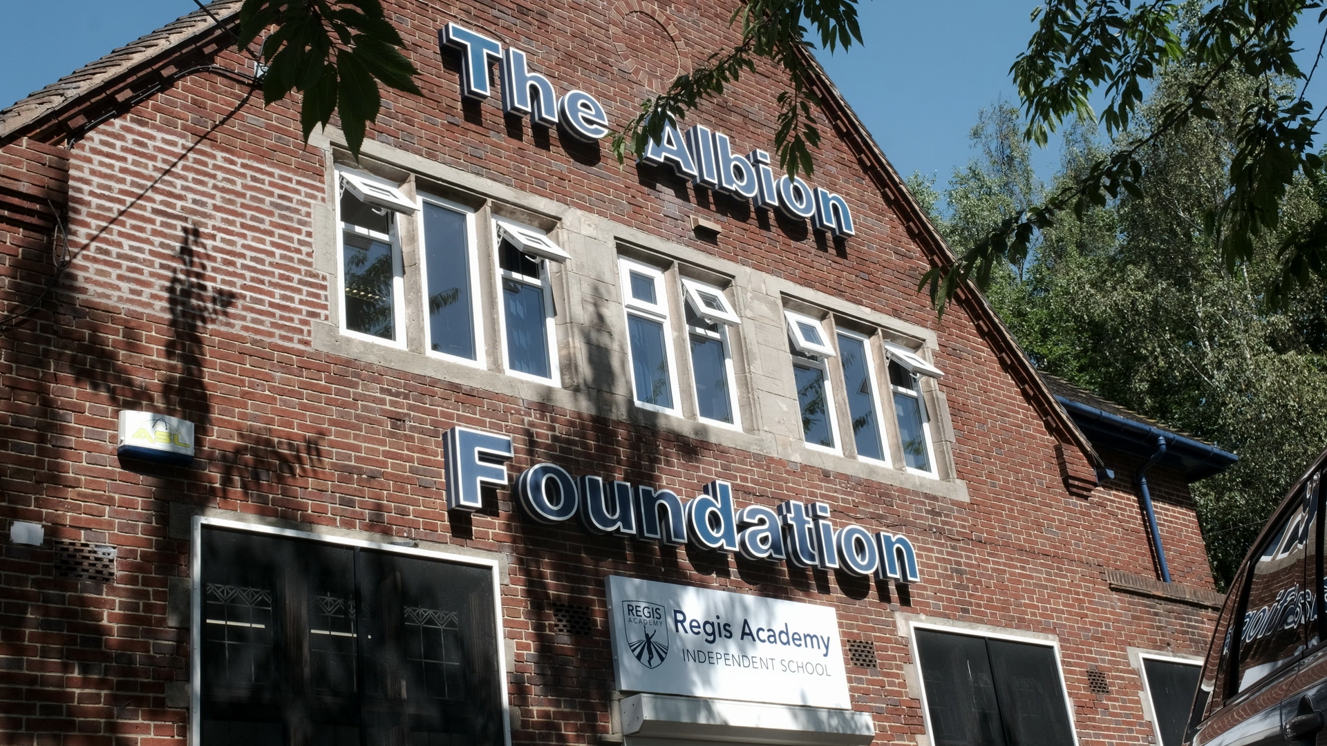 The Regis Academy Front