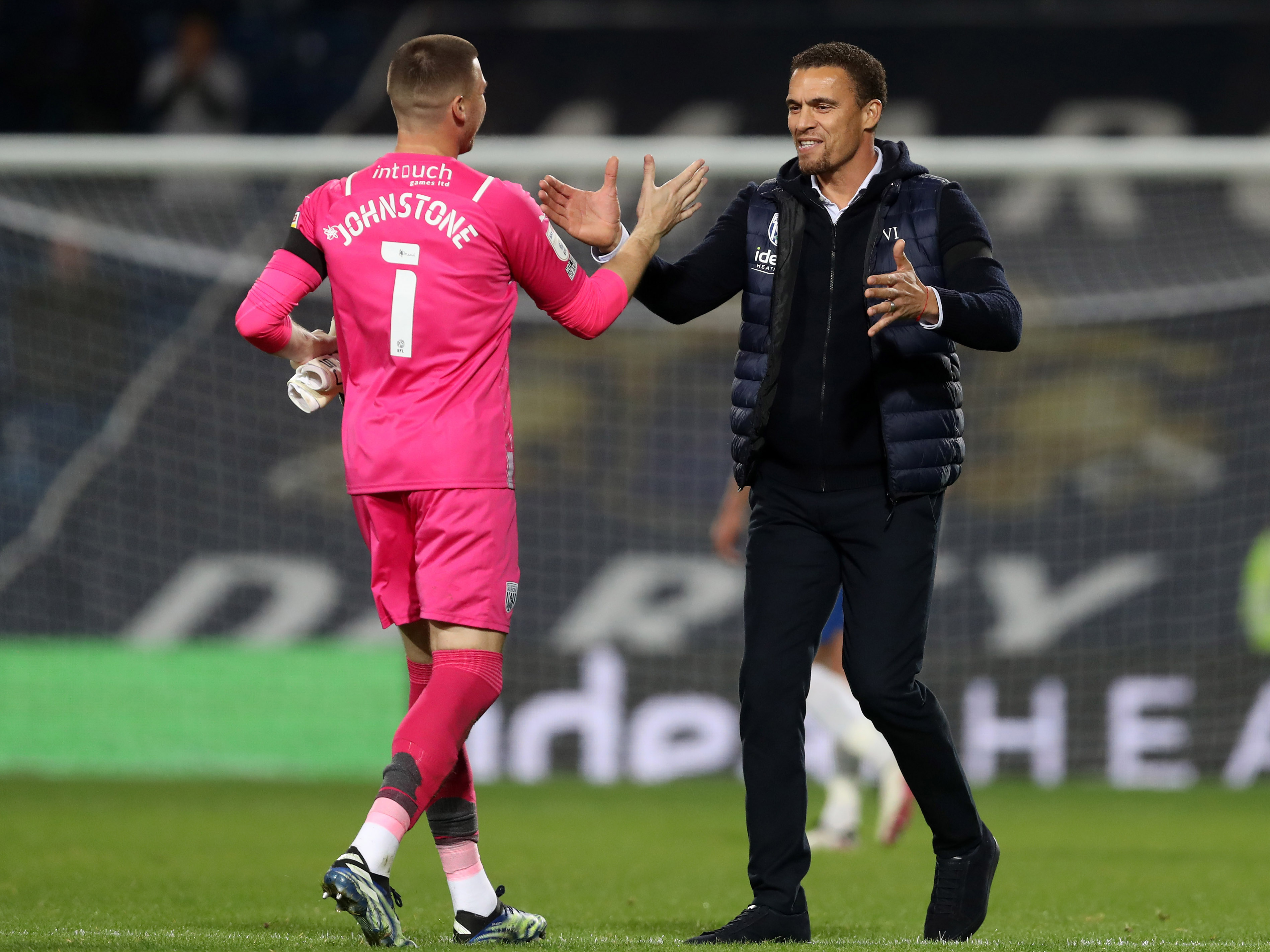 Valerien Ismael celebrates with Sam Johnstone after the win against Birmingham