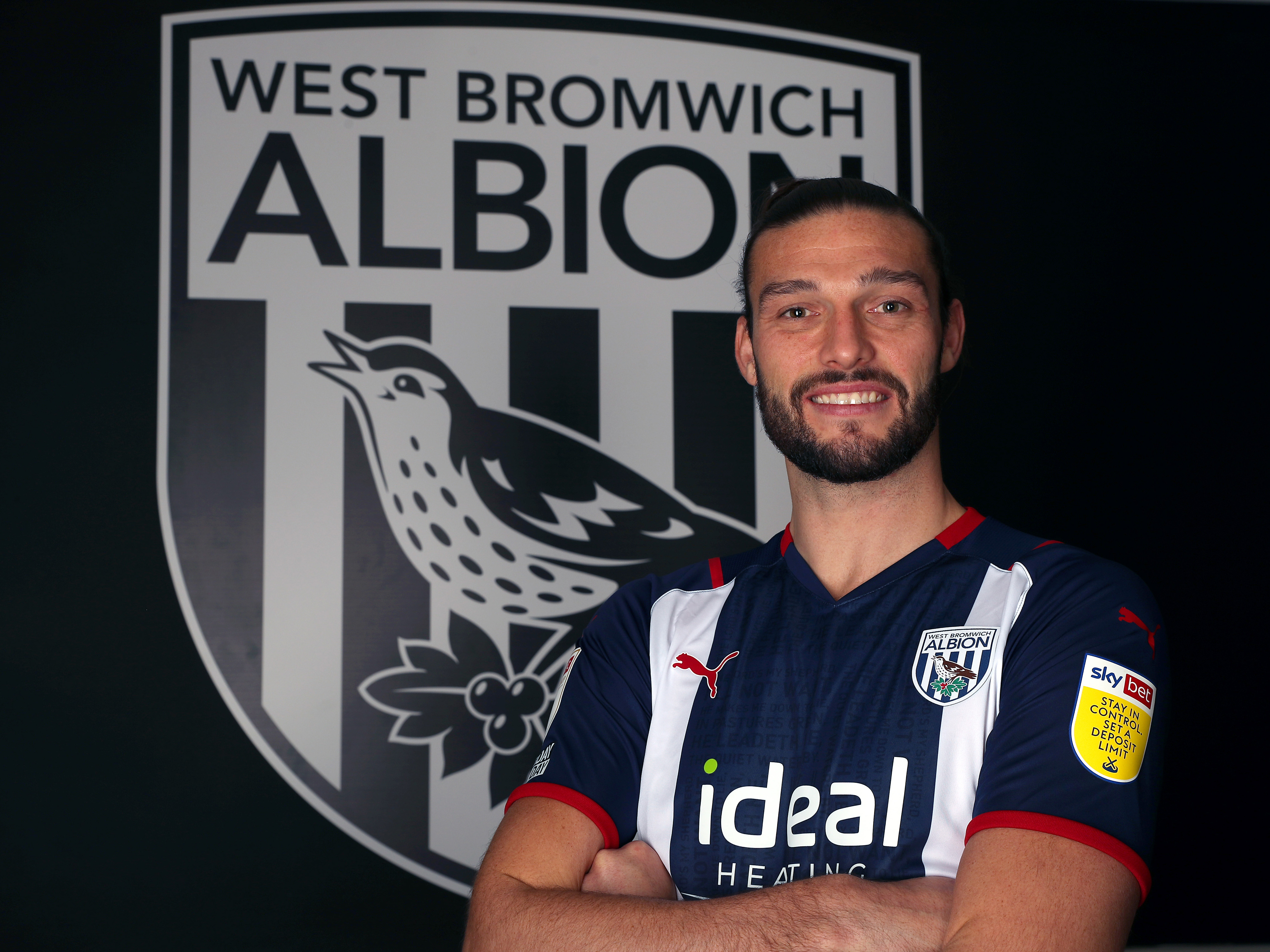 Andy Carroll signs for the Albion