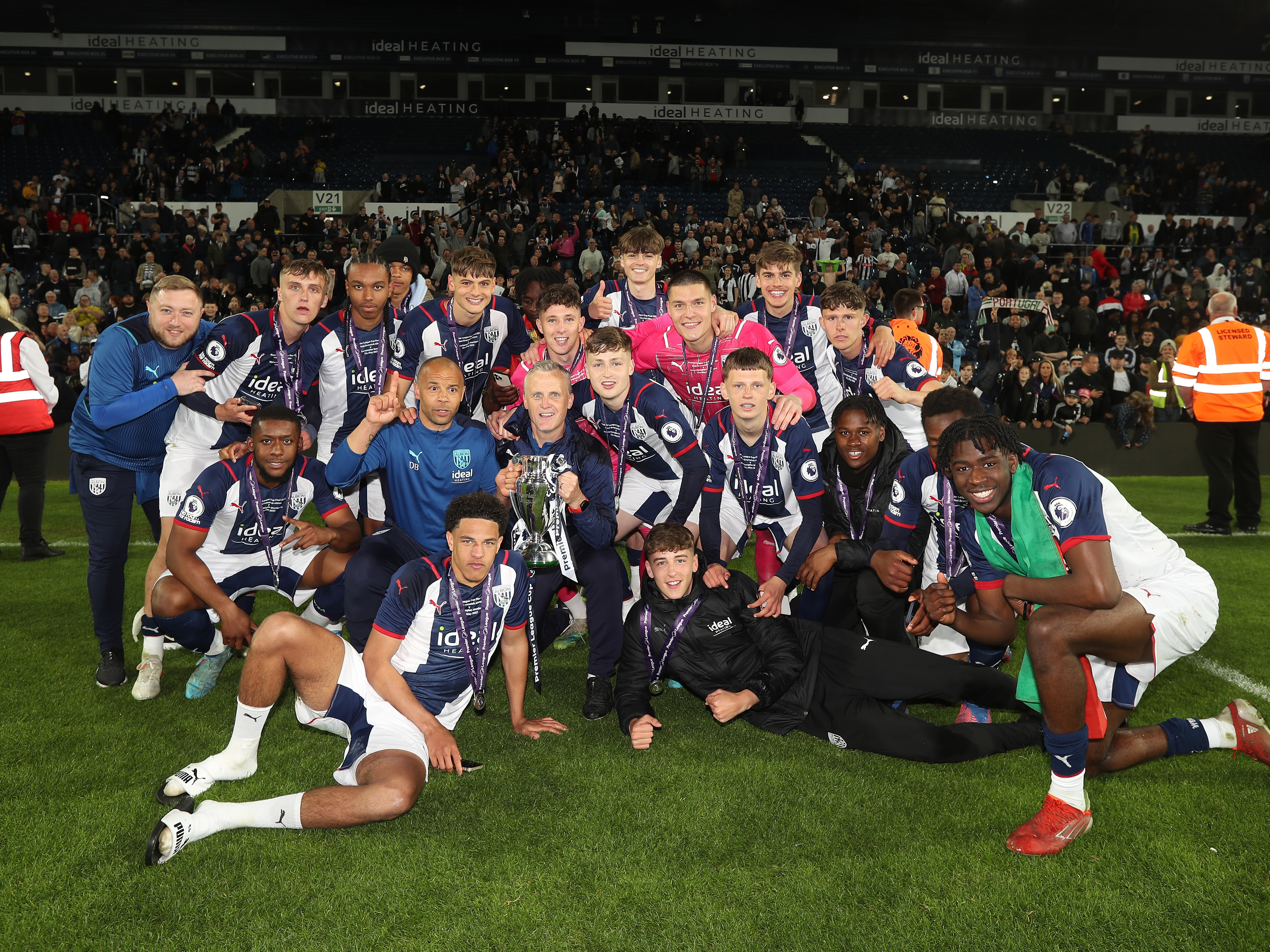 Albion players and staff celebrate their PL Cup success