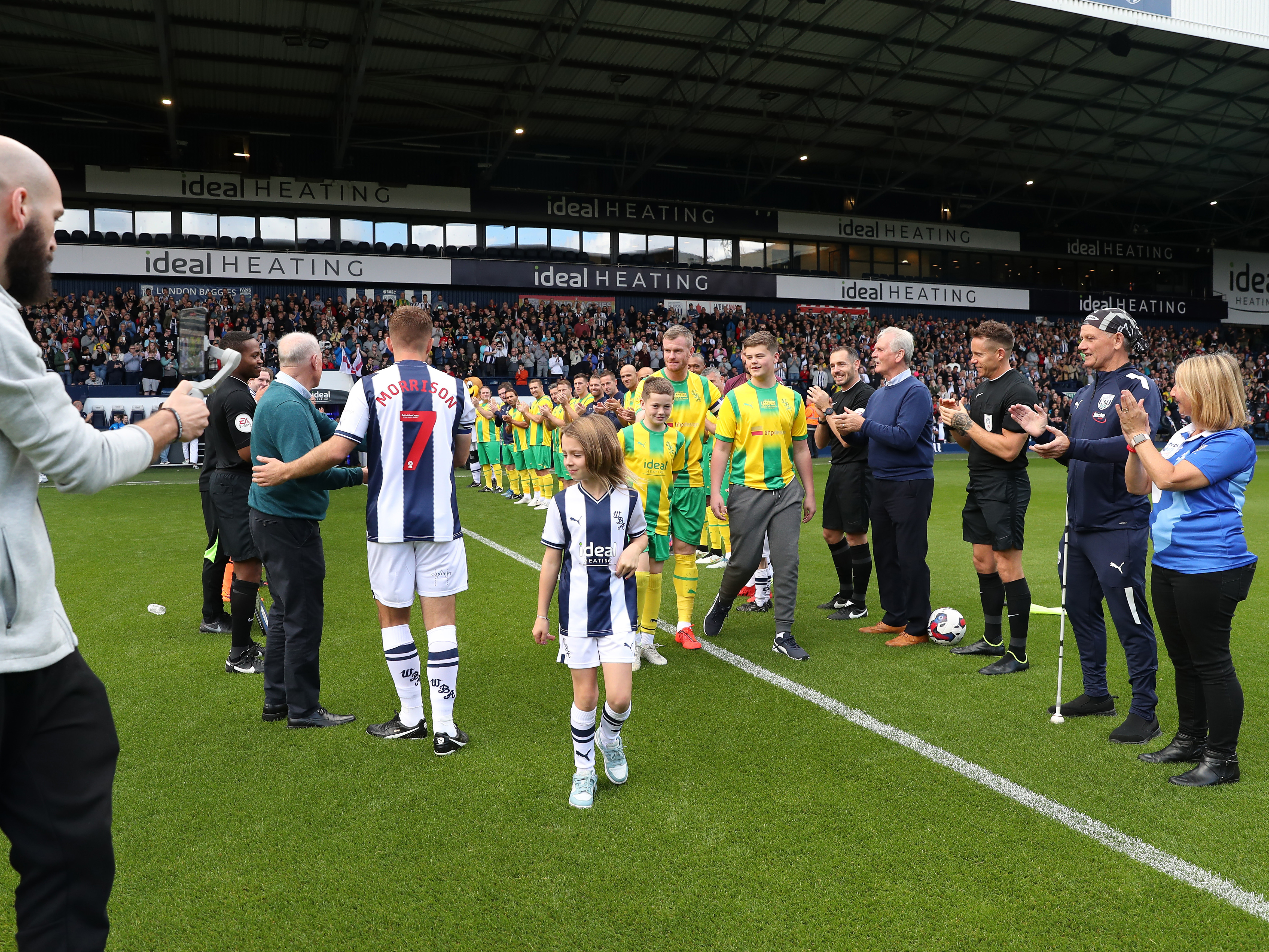 Players on the pitch at The Hawthorns before the 'Clash of the Legends'