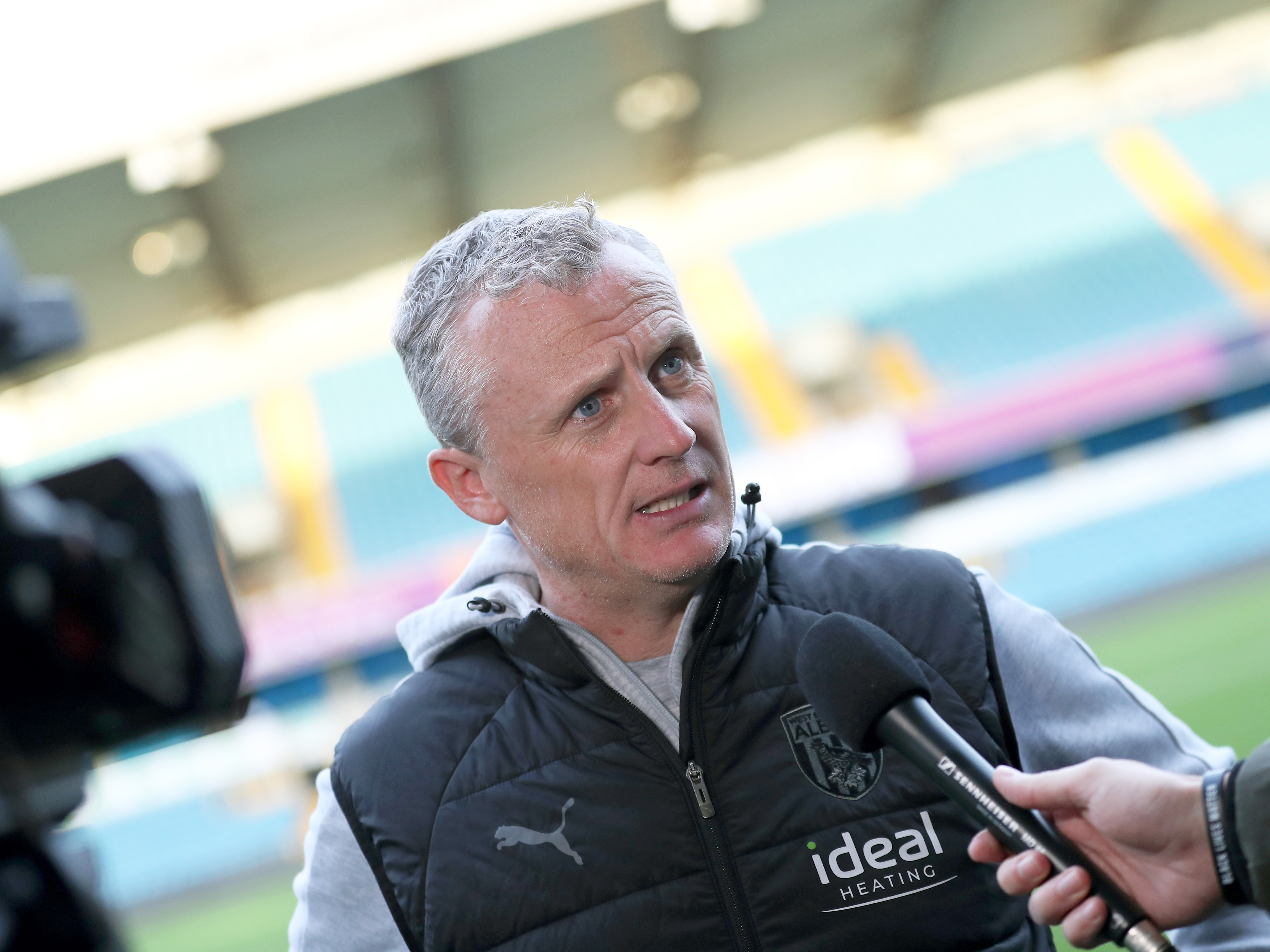 An image of Richard Beale talking to WBA TV after Albion's game against Millwall
