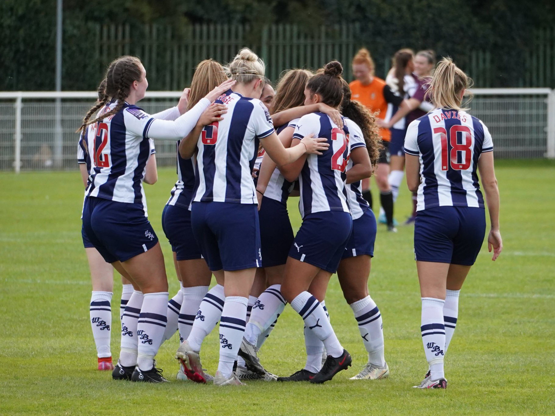 Evie Gallop celebrates with her teammates after scoring a late equaliser against Brighouse for Albion Women