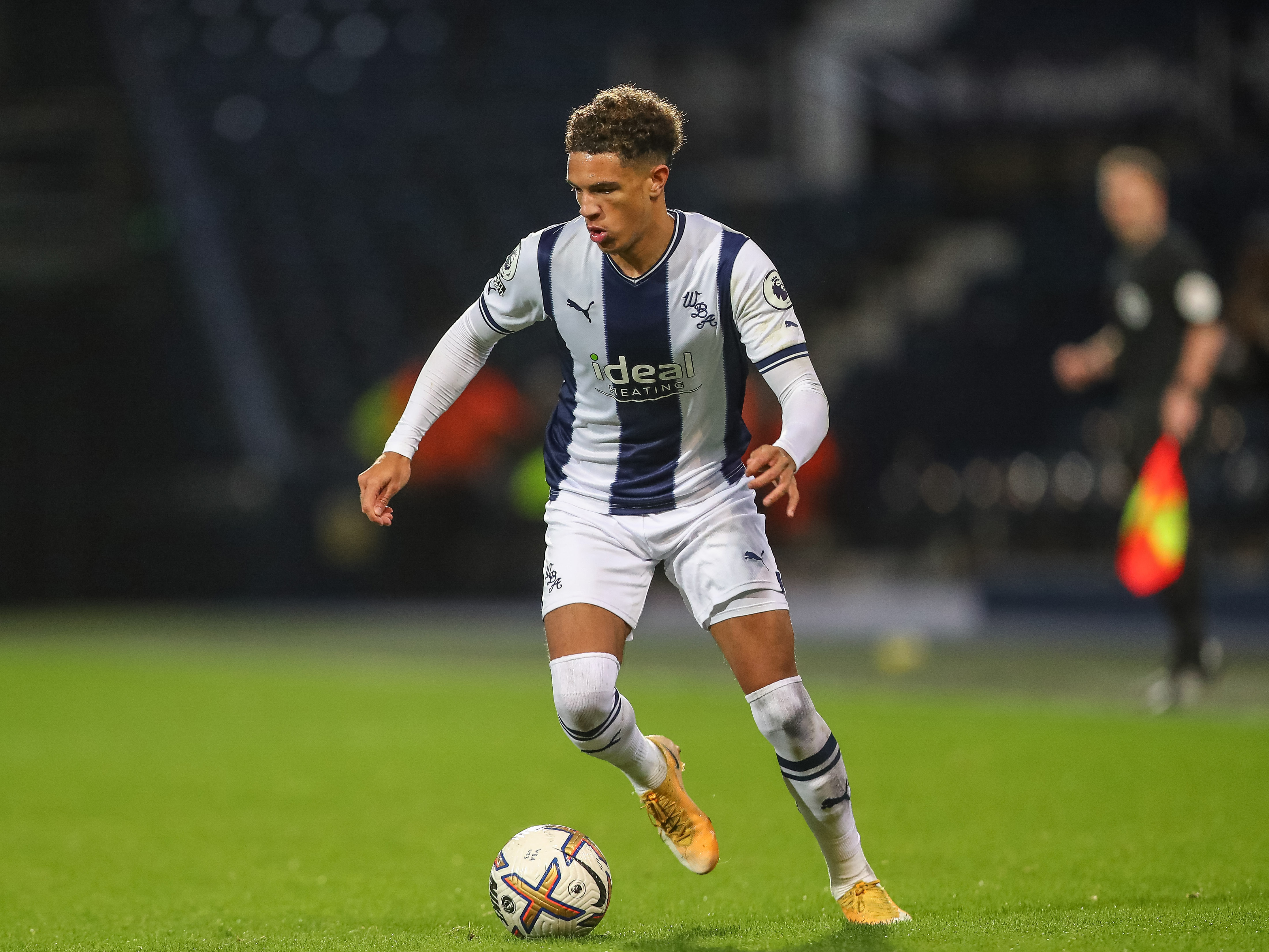 Ethan Ingram runs with the ball during Albion's PL2 match against Nottingham Forest at The Hawthorns