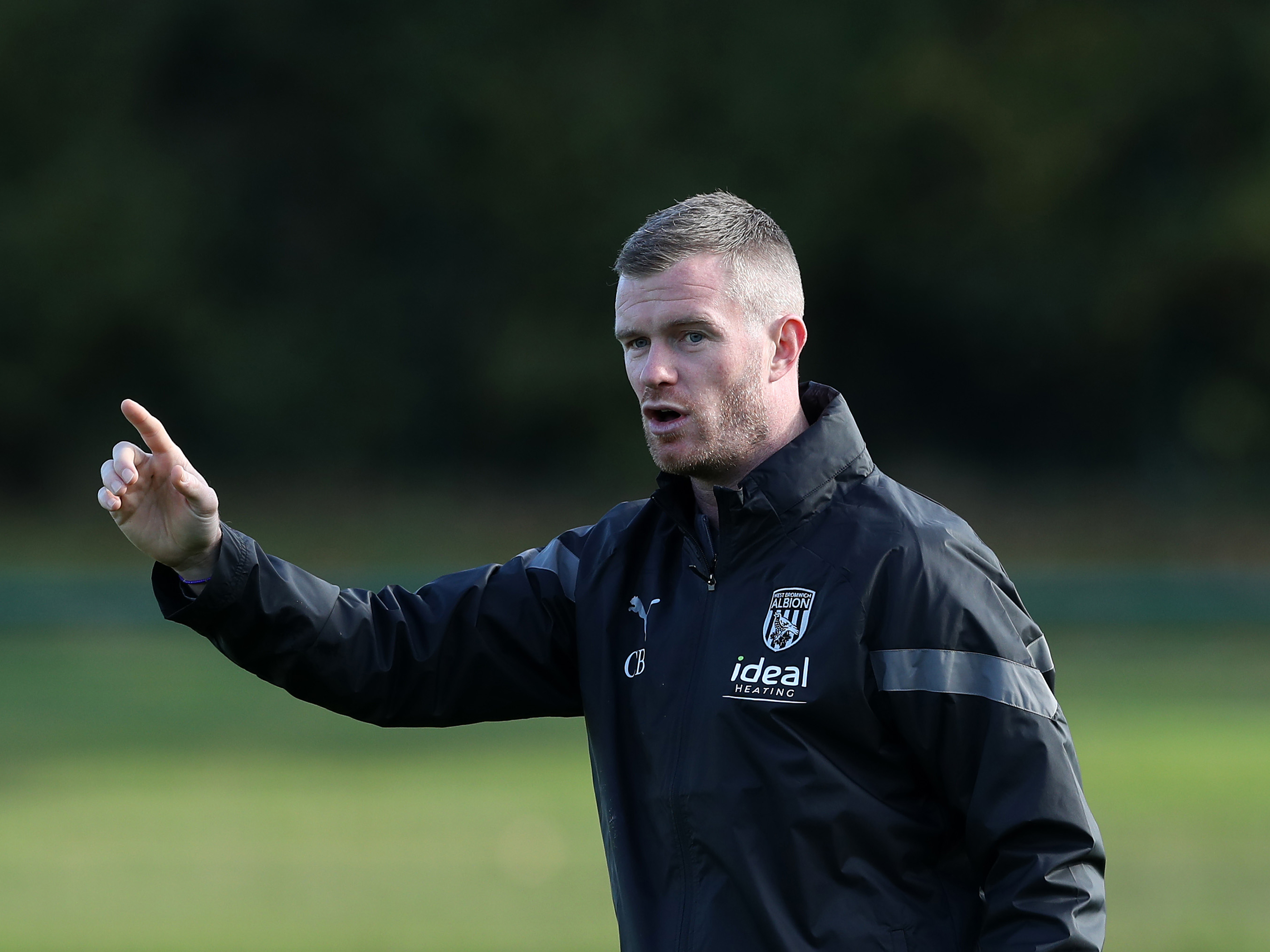 Chris Brunt coaching during a training session