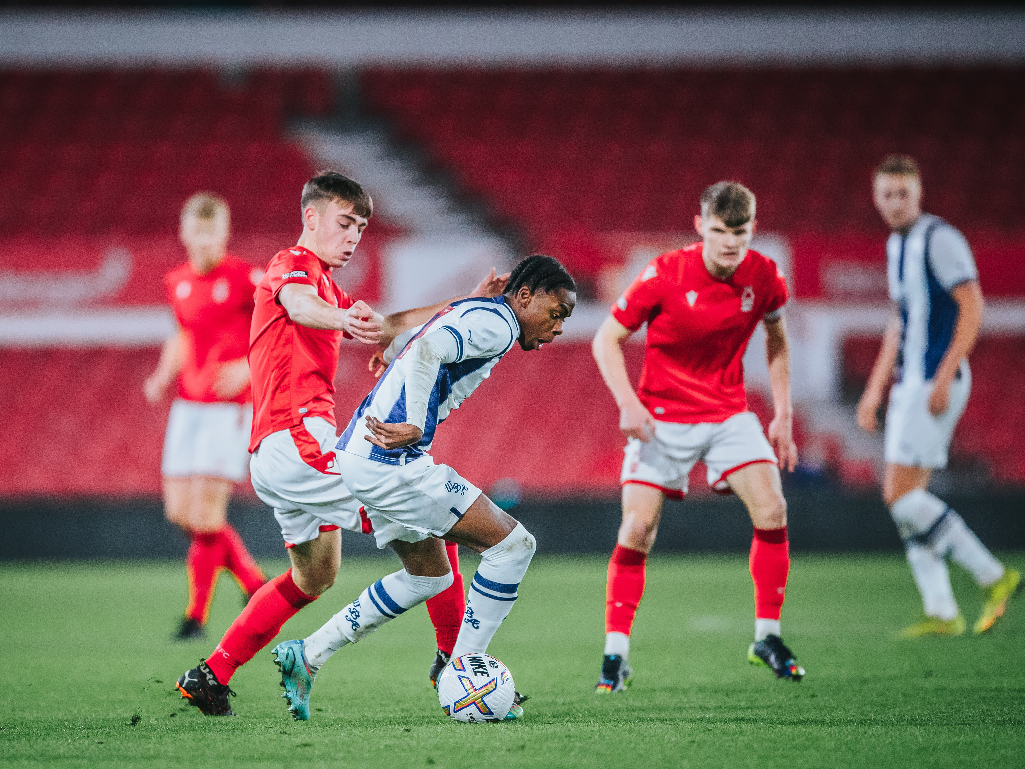 Akeel Higgins holds onto the ball for Albion against Nottingham Forest in the FA Youth Cup