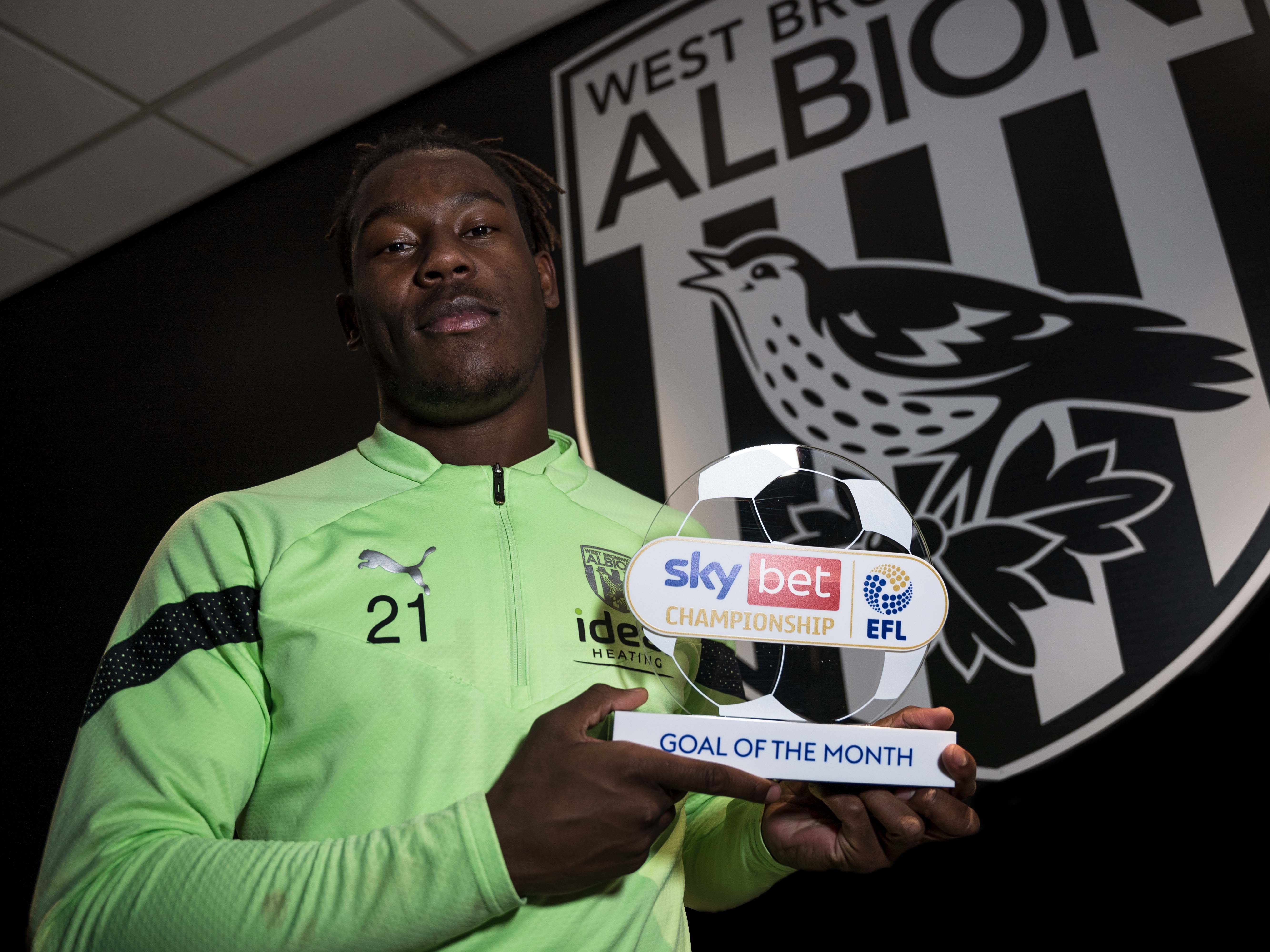 Brandon Thomas-Asante with his Goal of the Month award
