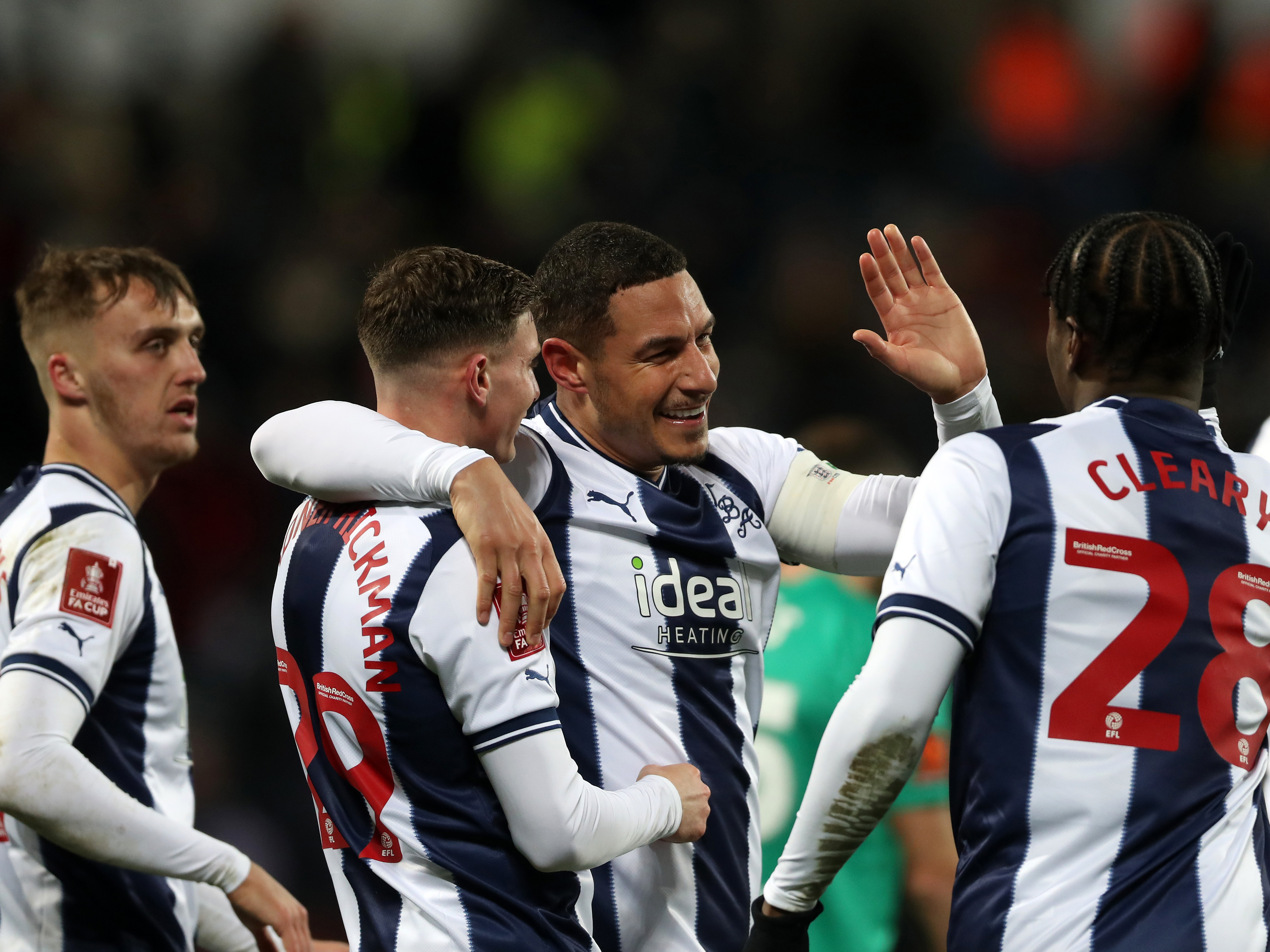 An image of Jake Livermore celebrating with his teammates after a goal against Chesterfield