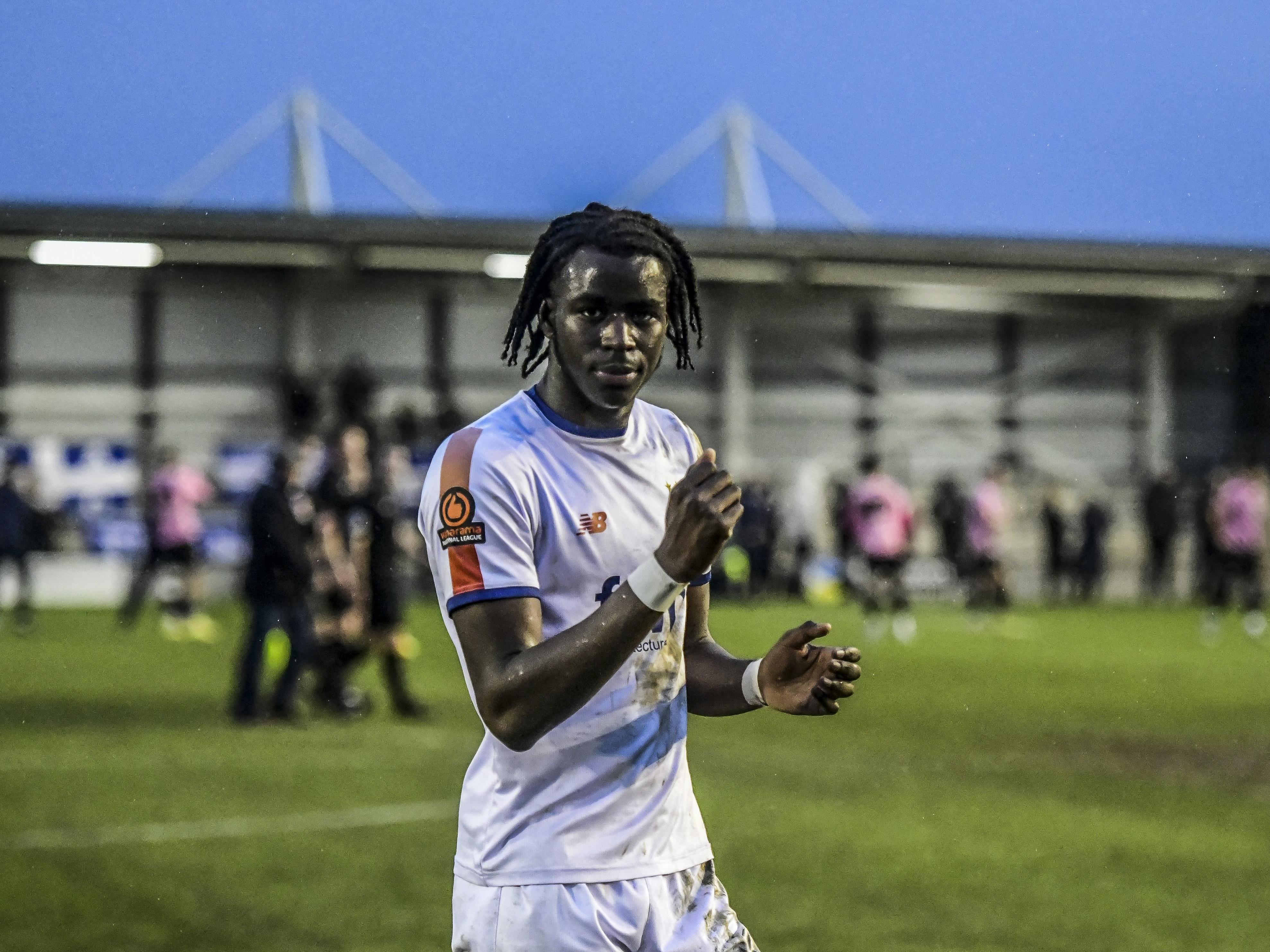 Mo Faal celebrates after AFC Fylde's victory over Curzon Ashton