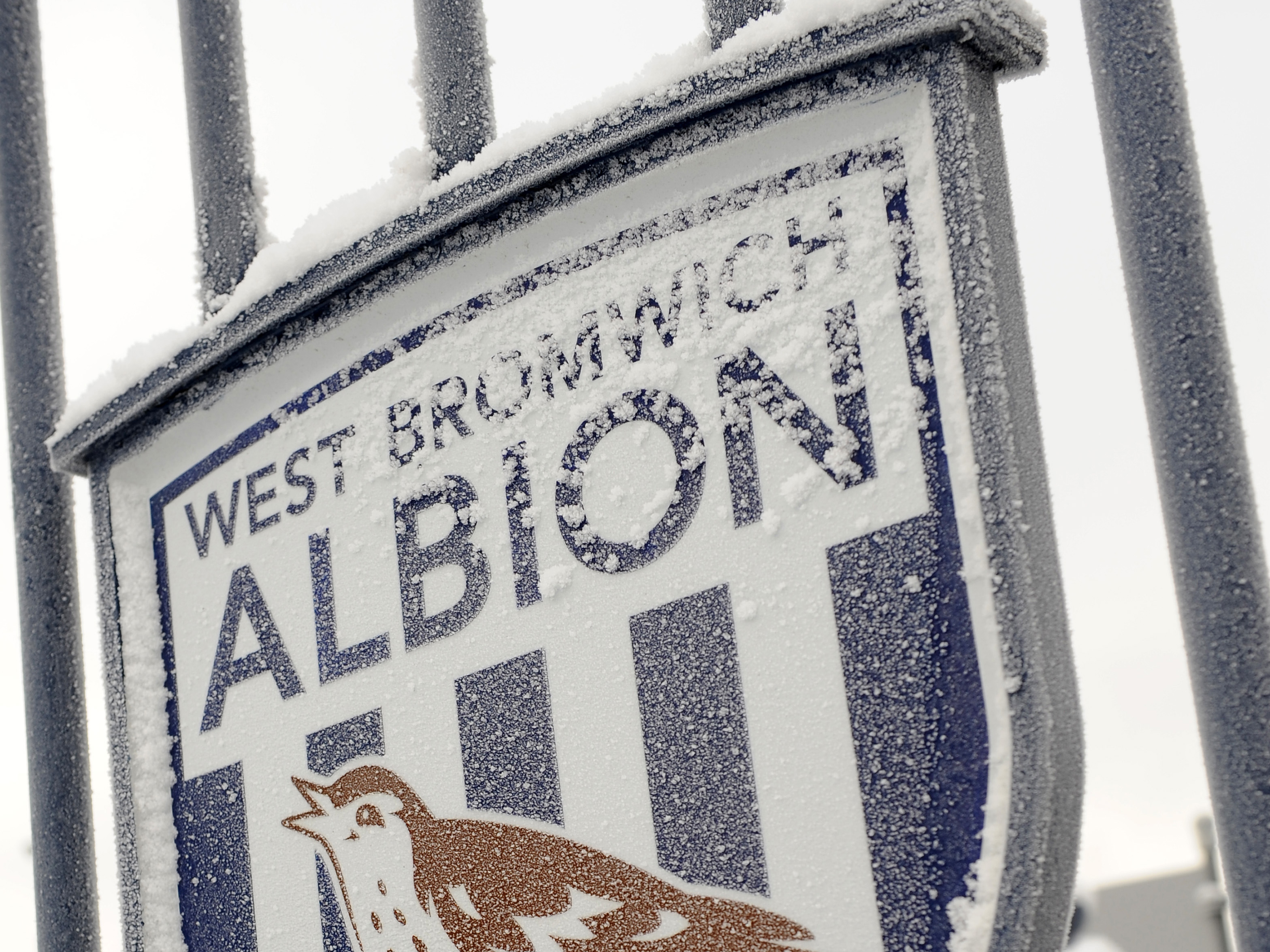 An icy Albion badge on the Astle Gates