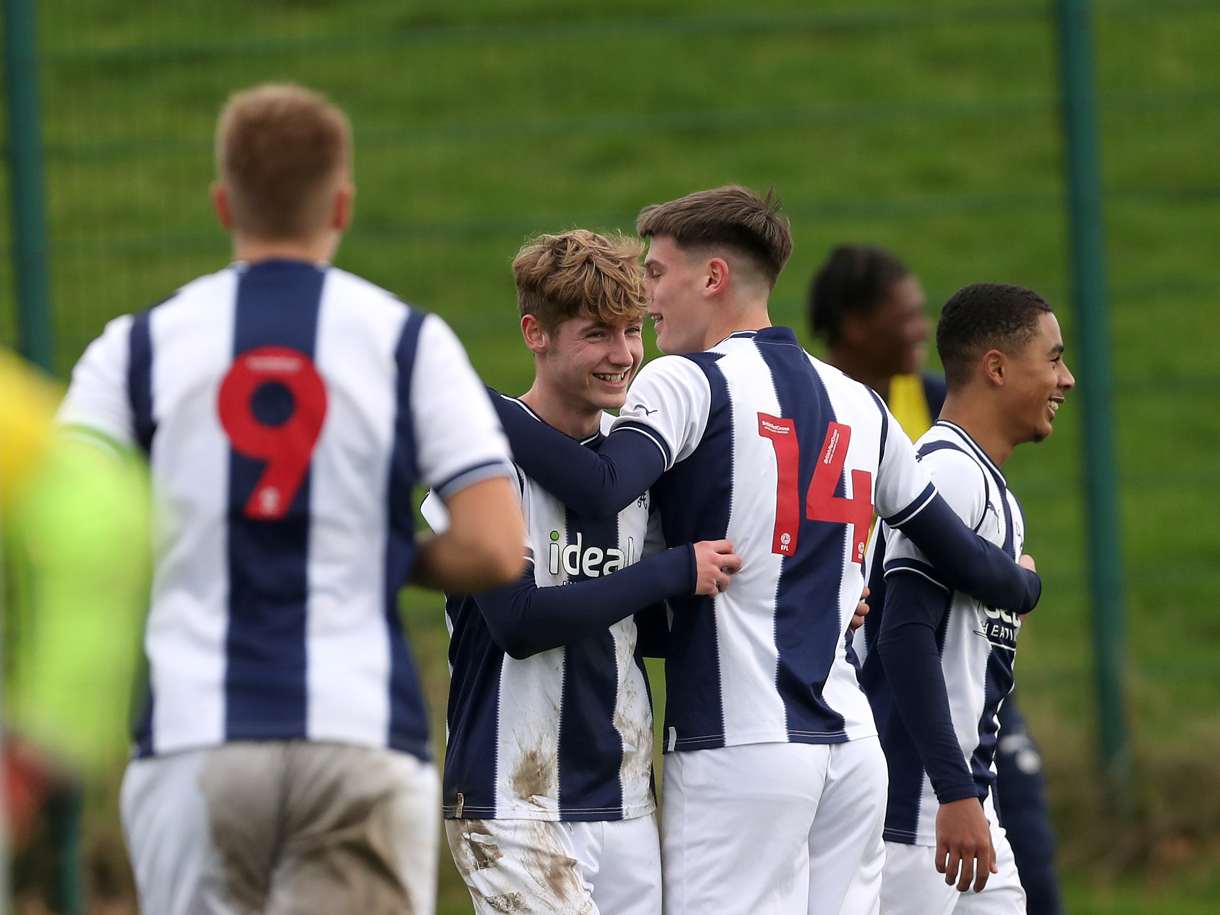 Albion U18 players celebrate after scoring a goal