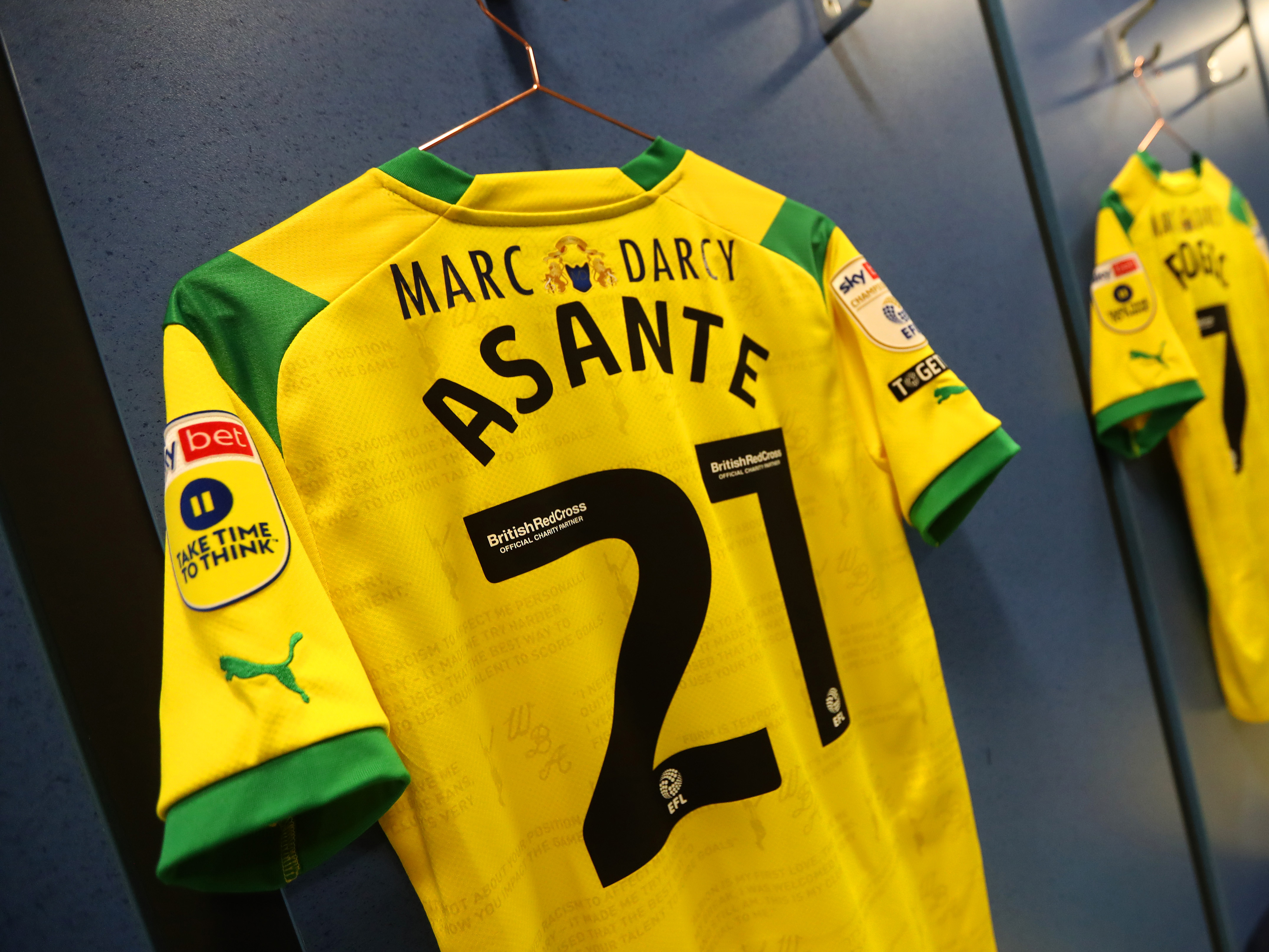 Brandon Thomas-Asante's green and yellow shirt