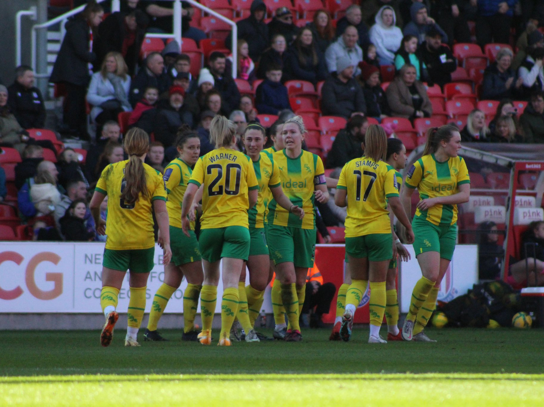 An image of Albion Women celebrating a goal against Stoke
