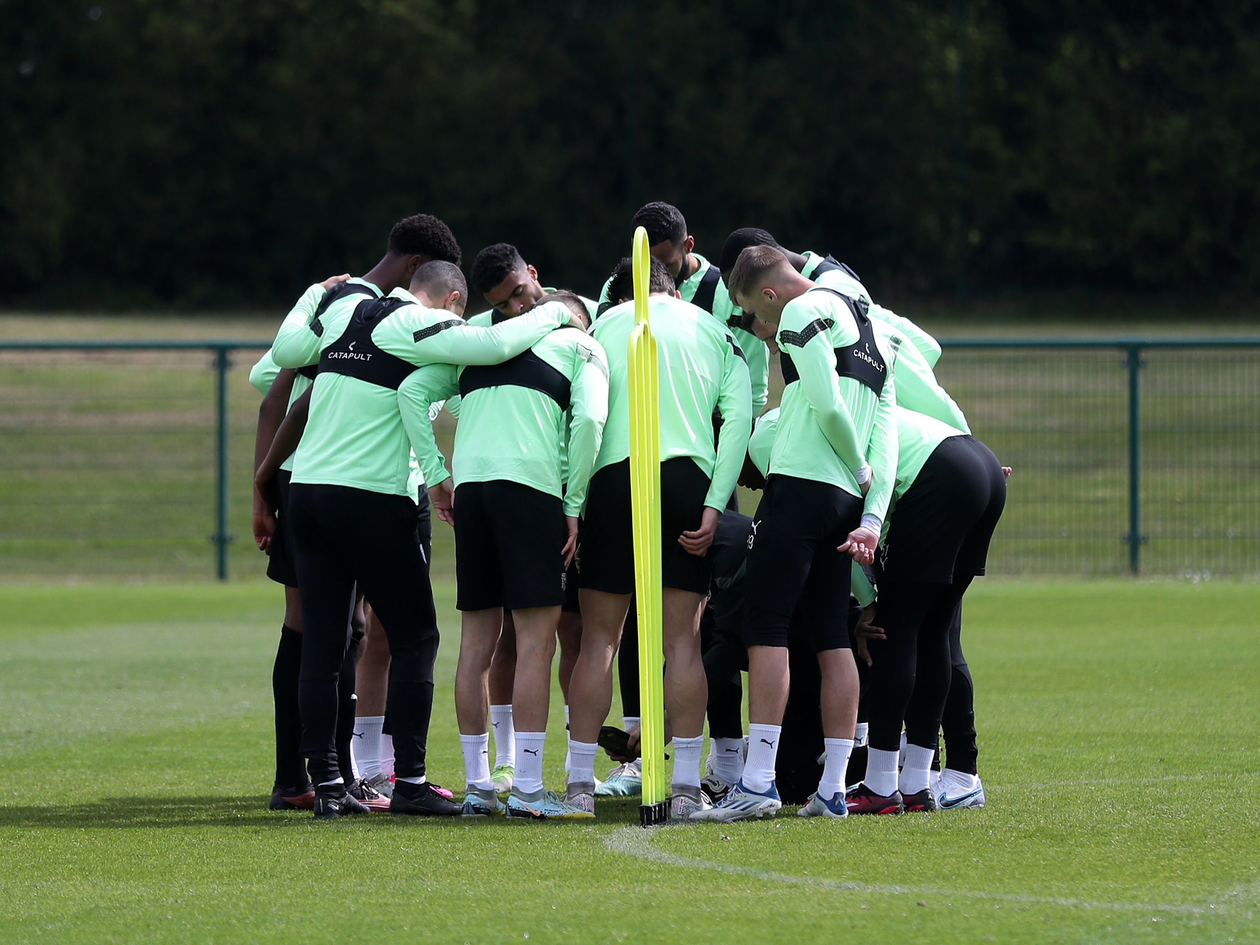 Albion players in a huddle in training 