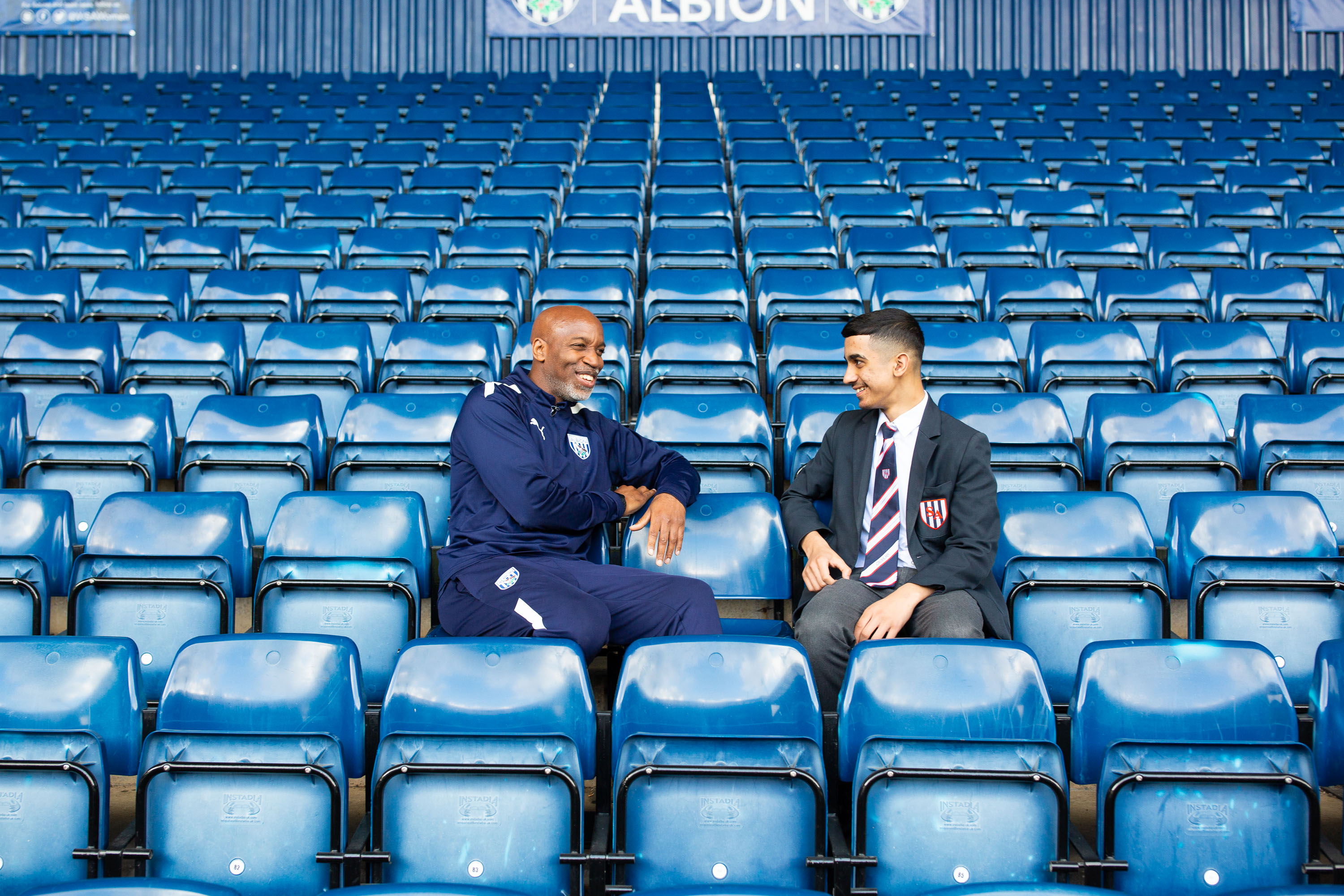 Foundation staff mentoring a student in The Hawthorns Stands