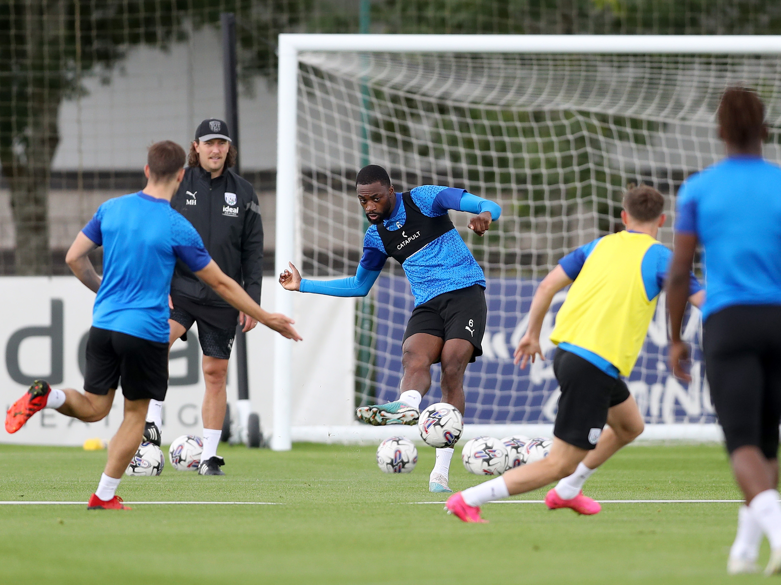 Semi Ajayi looks to pick a pass in training 