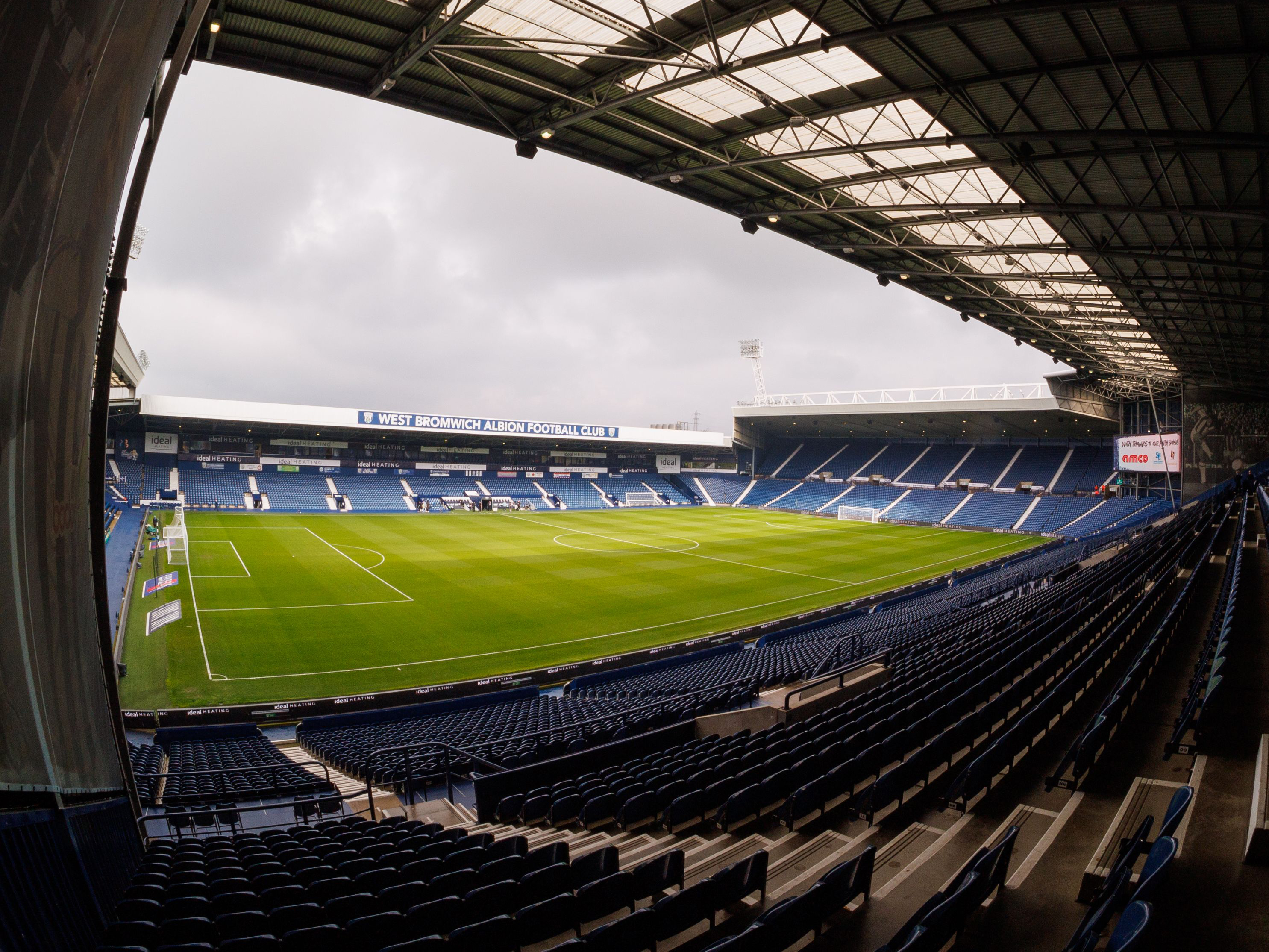 An image of The Hawthorns shot from the corner of the East Stand 