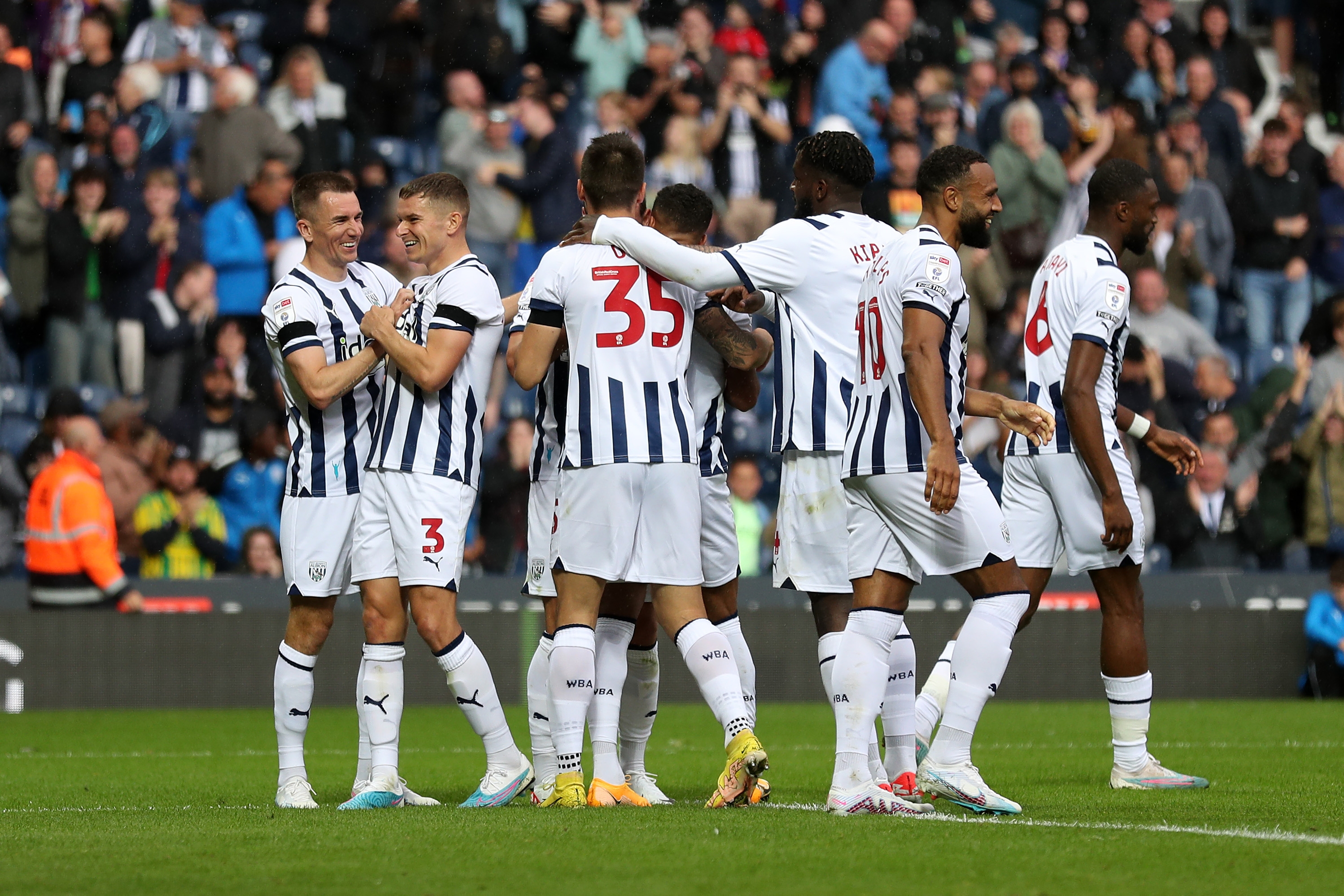 Albion players celebrate their second goal against Swansea 
