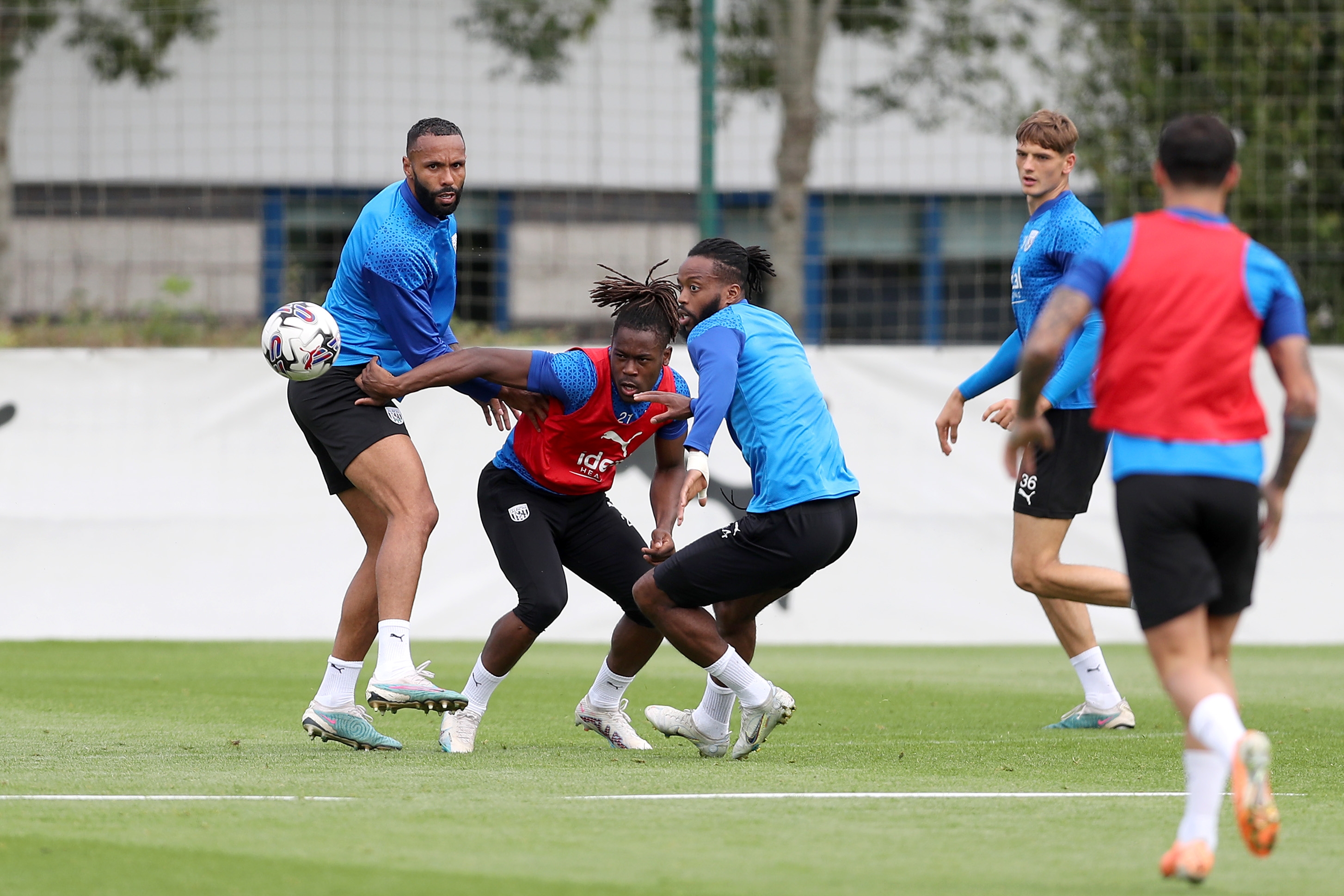 Brandon Thomas-Asante and Nathaniel Chalobah battle for the ball in training 