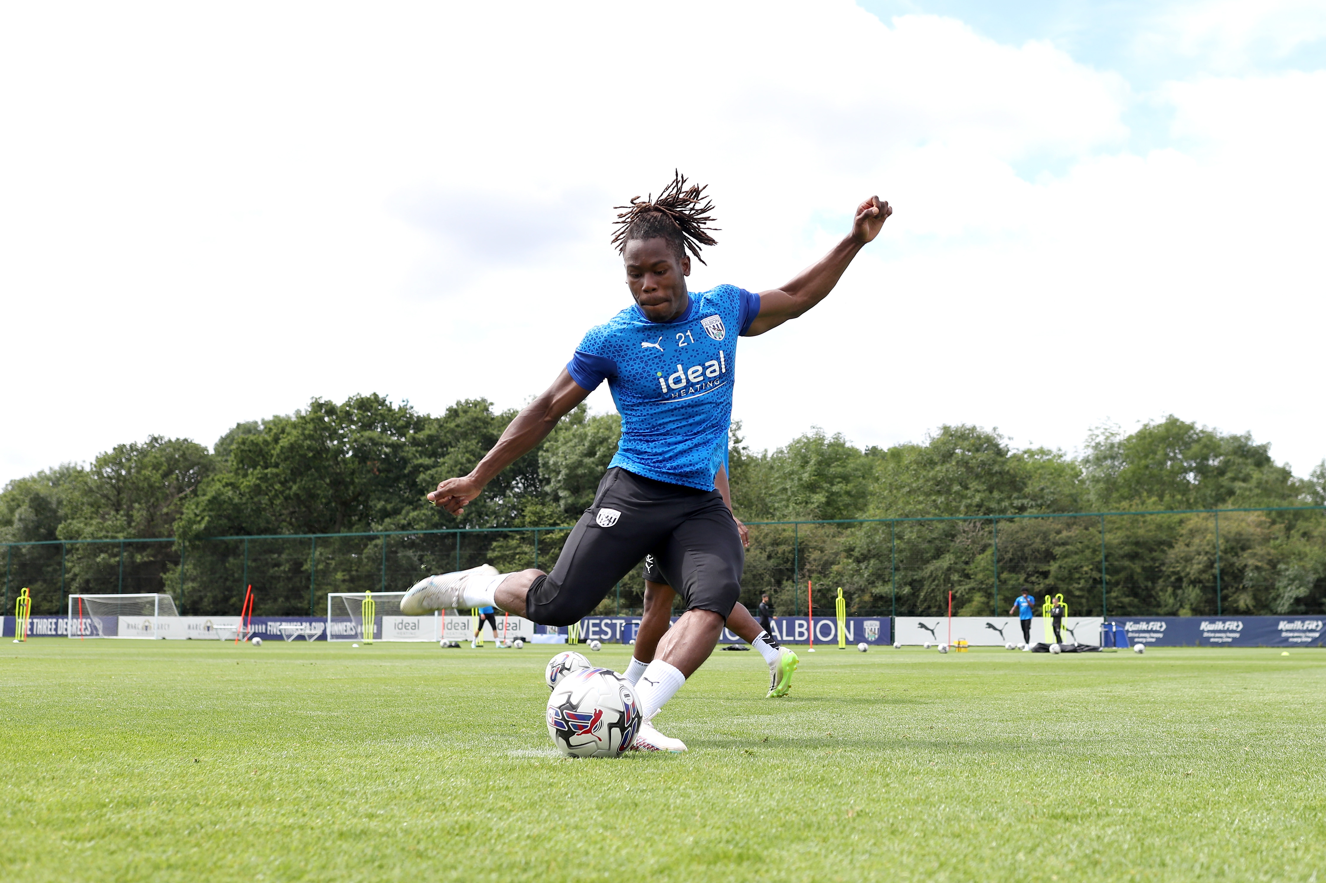 Brandon Thomas-Asante strikes the ball in training 