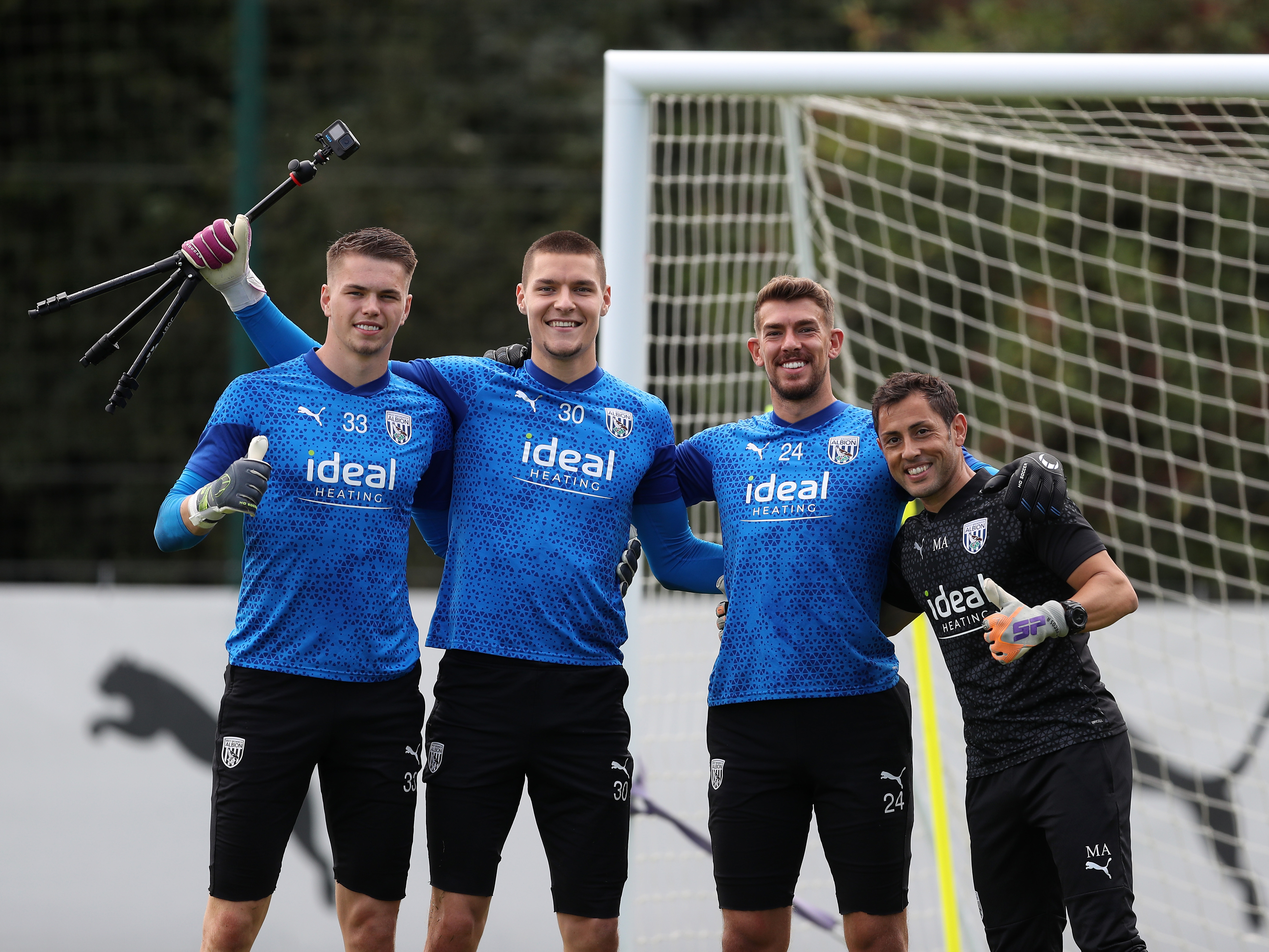 Josh Griffiths, Ted Cann, Alex Palmer and Marcos Abad pose for a photo in training 