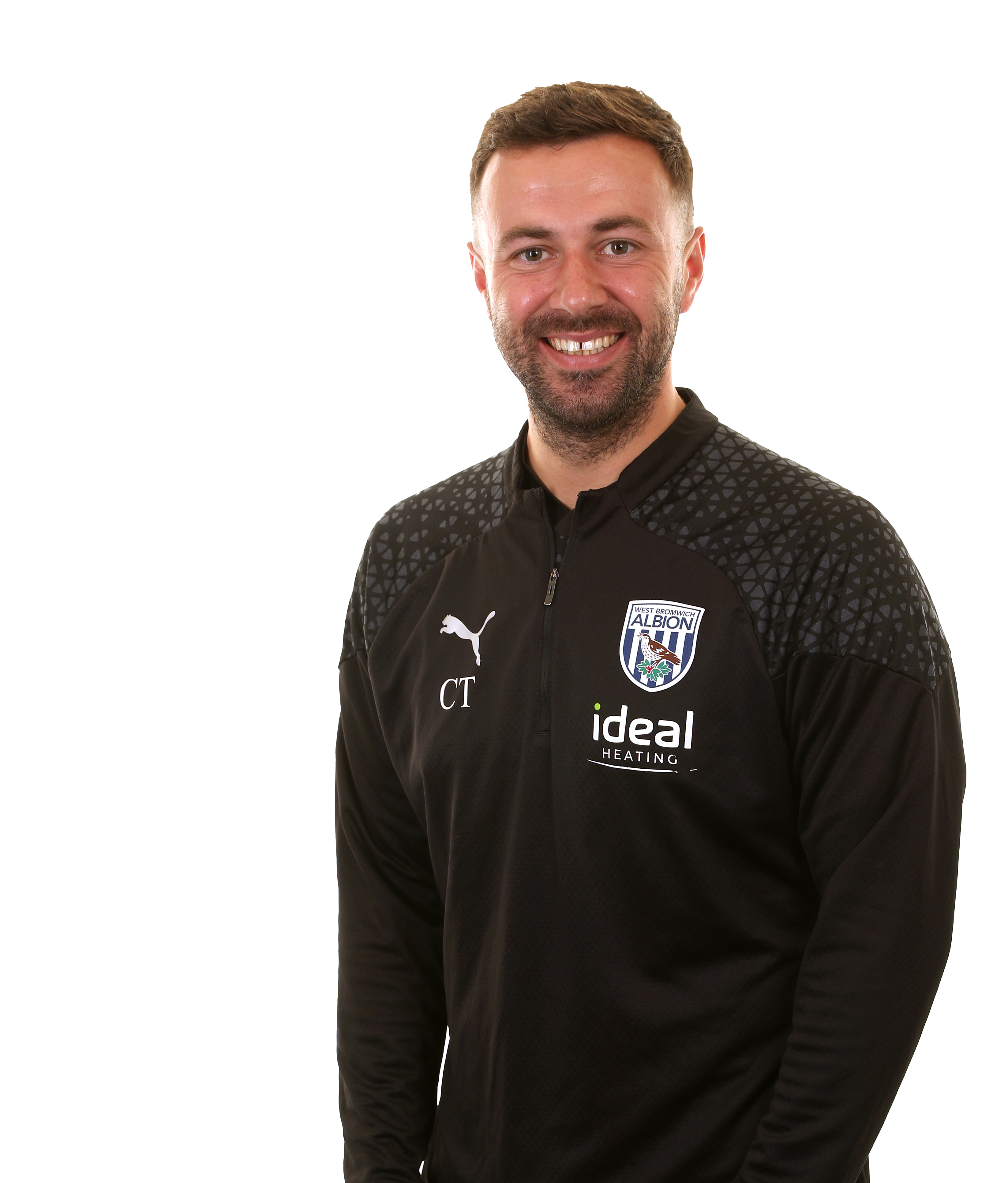 A photo headshot of Albion Under-18s assistant coach Chay Thompson ahead of the 2023/24 season