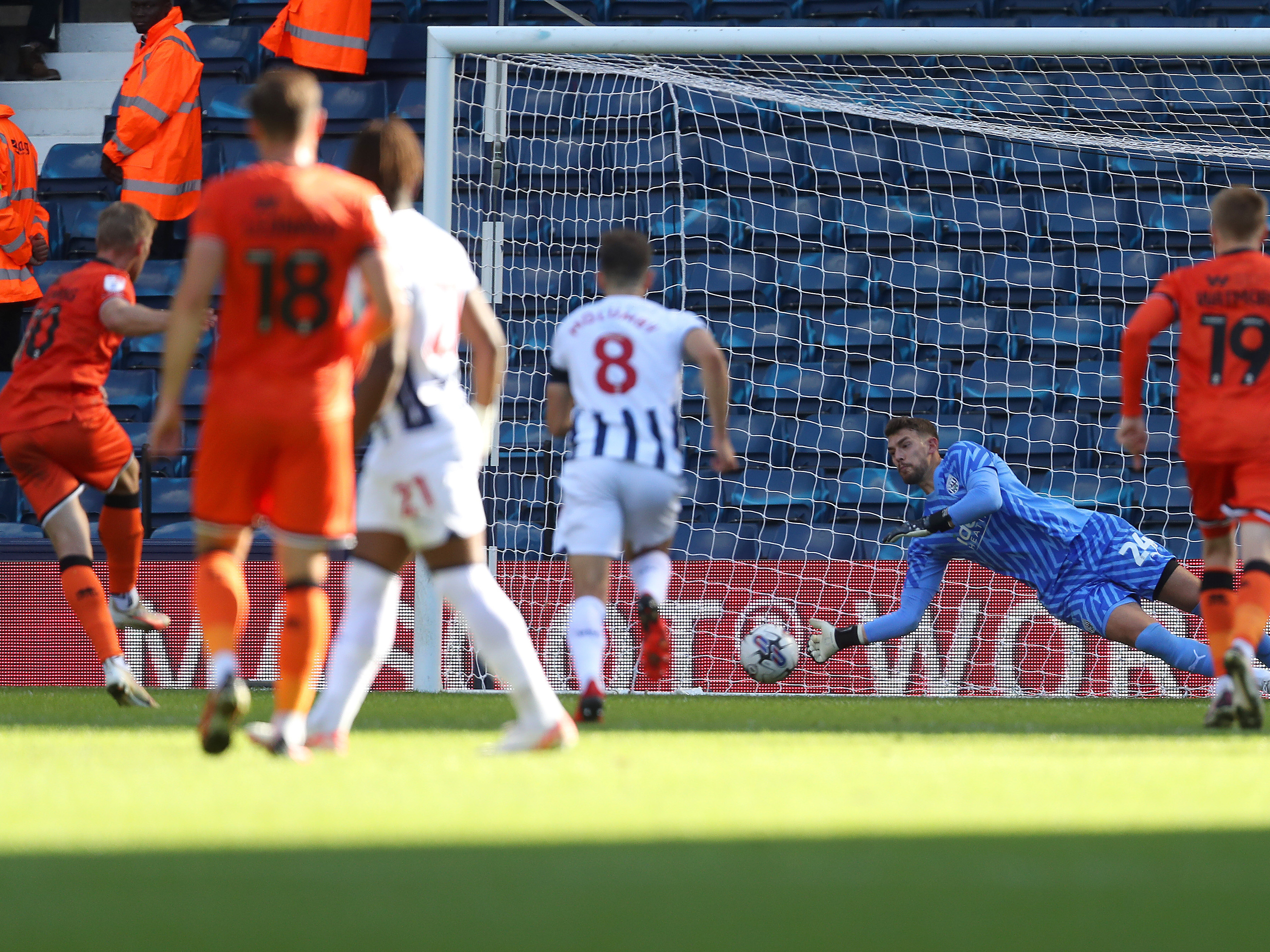 An image of Alex Palmer saving a Millwall penalty