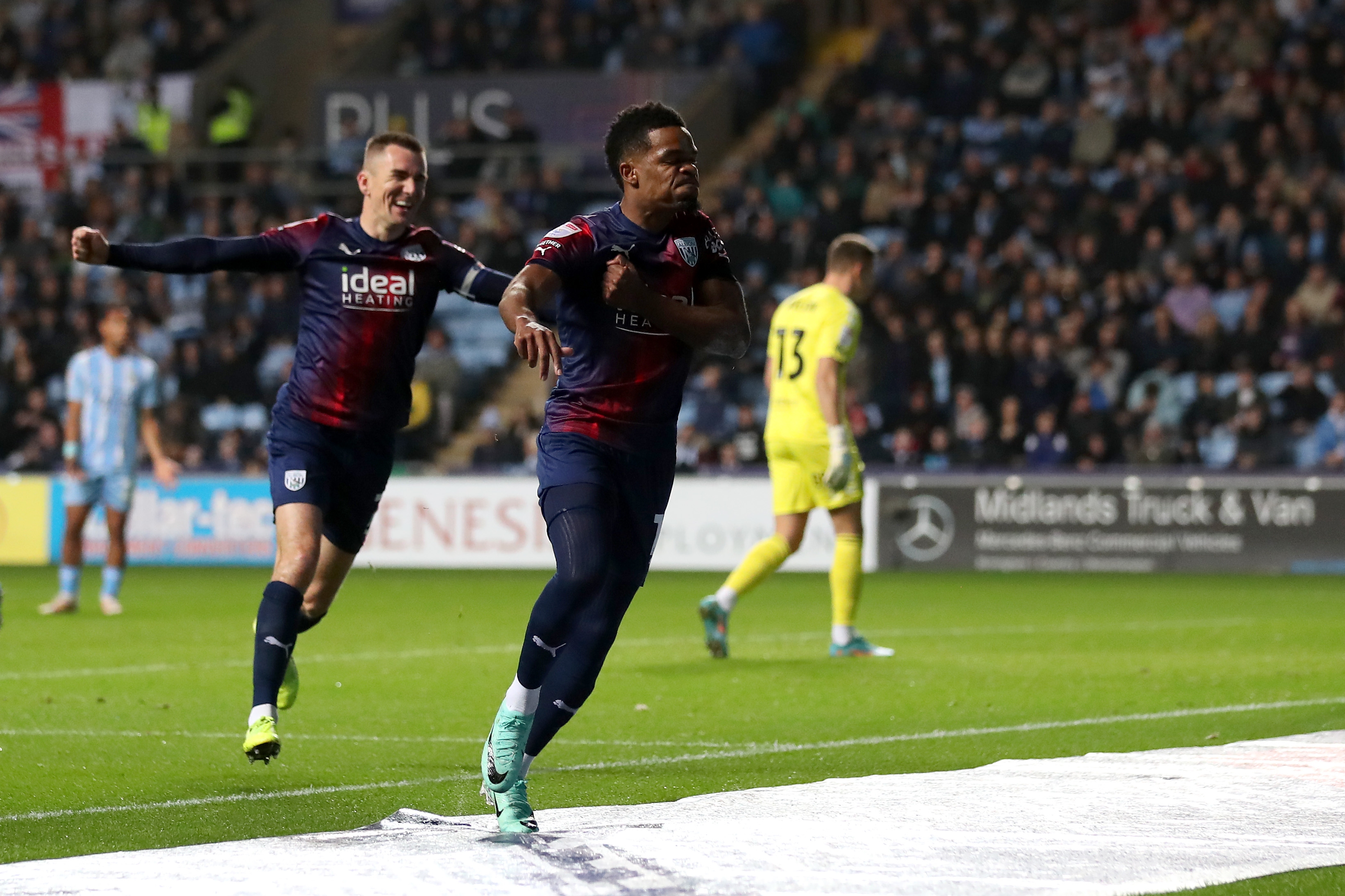 Grady Diangana celebrates scoring against Coventry with Jed Wallace in the background 