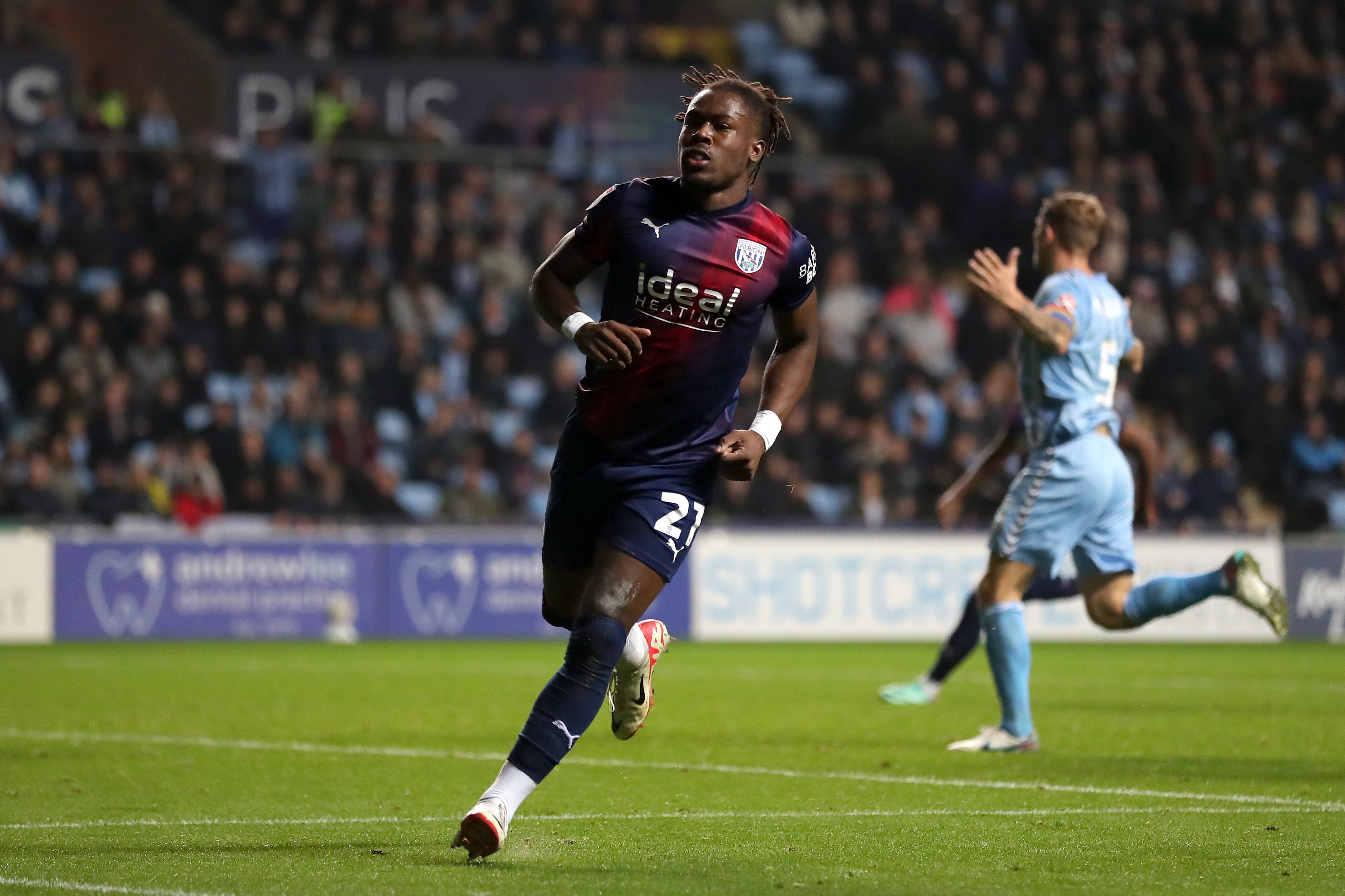 Brandon Thomas-Asante celebrates scoring against Coventry City