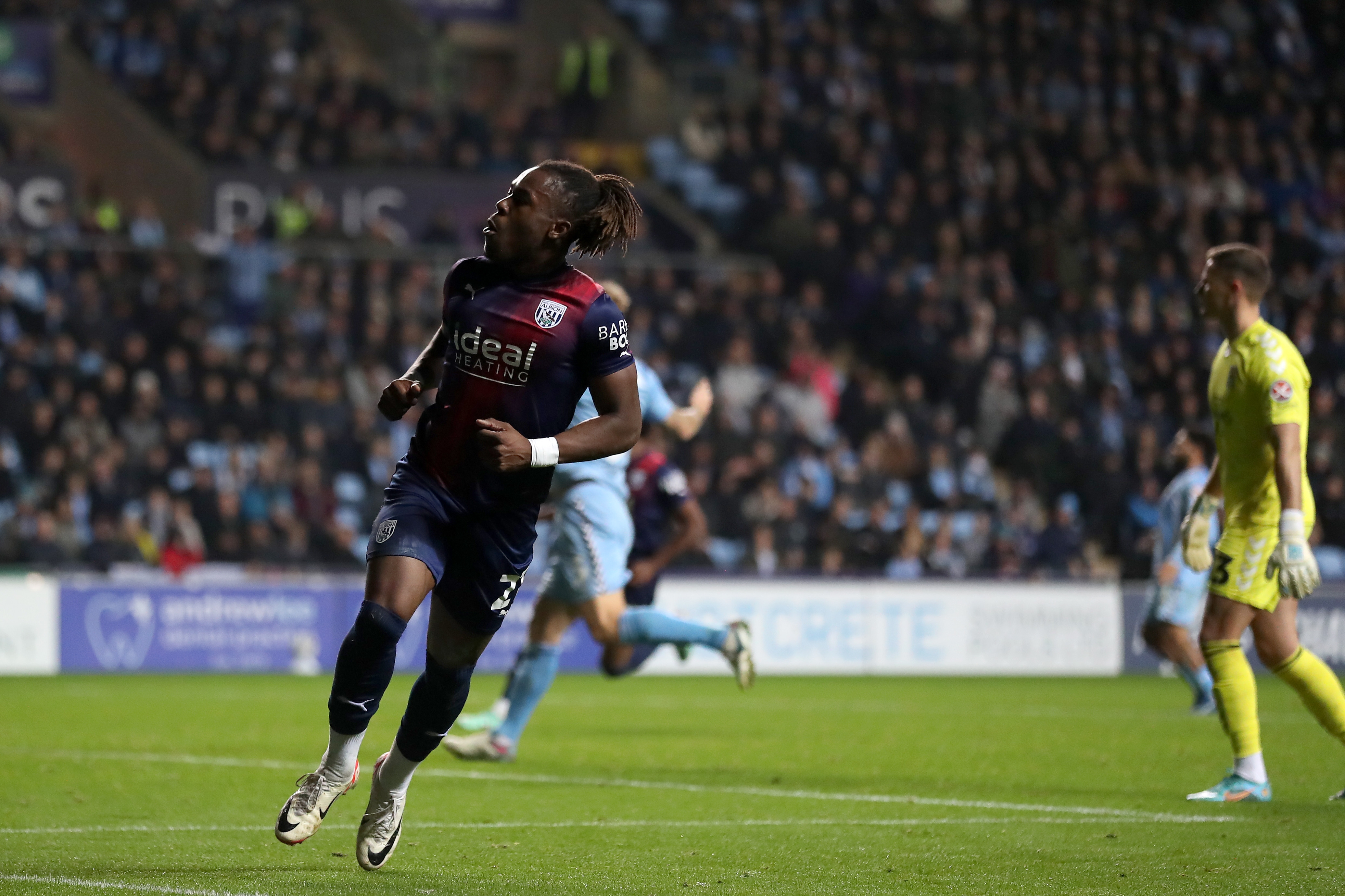 Brandon Thomas-Asante celebrates scoring against Coventry City