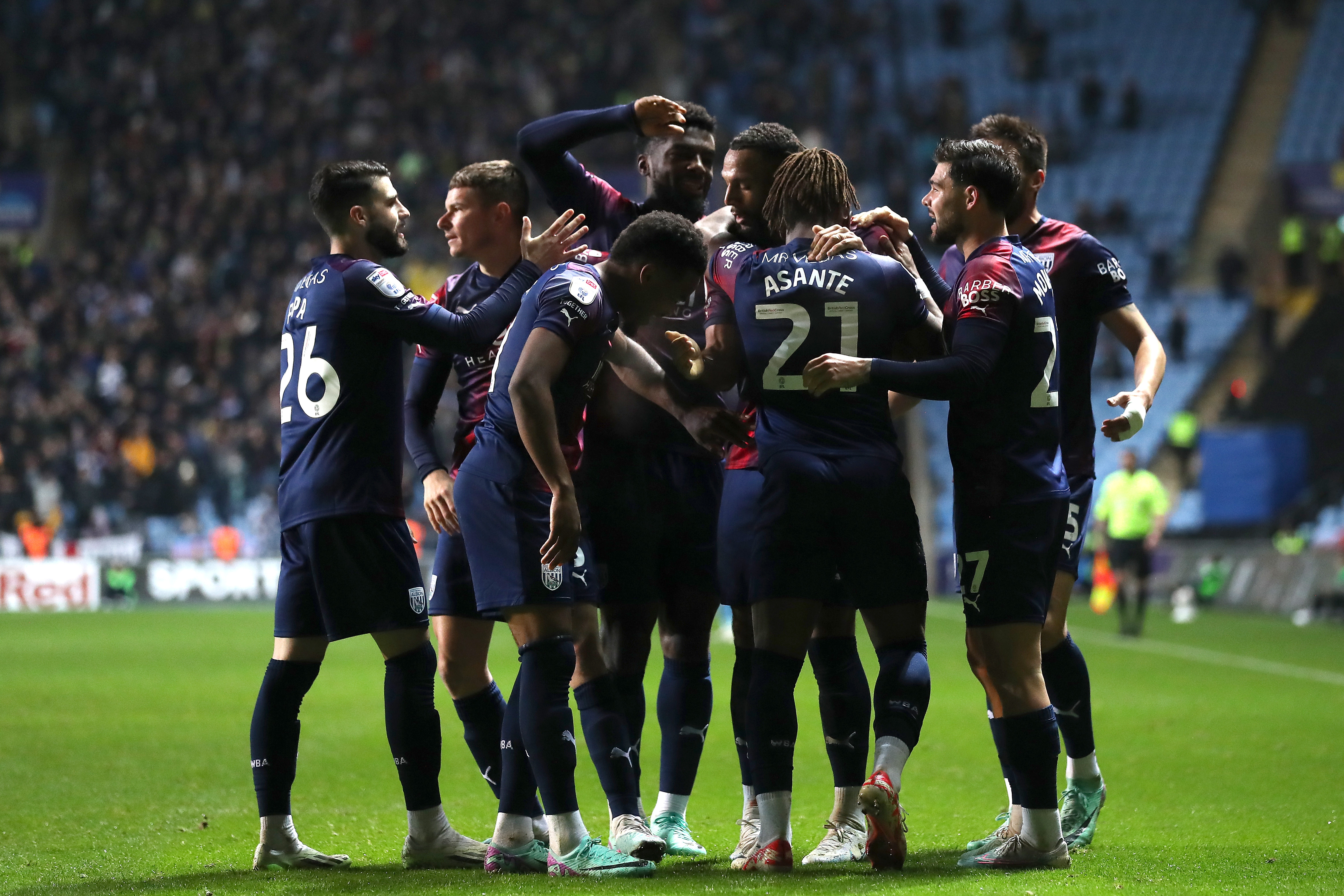 Brandon Thomas-Asante celebrates scoring against Coventry City with his team-mates