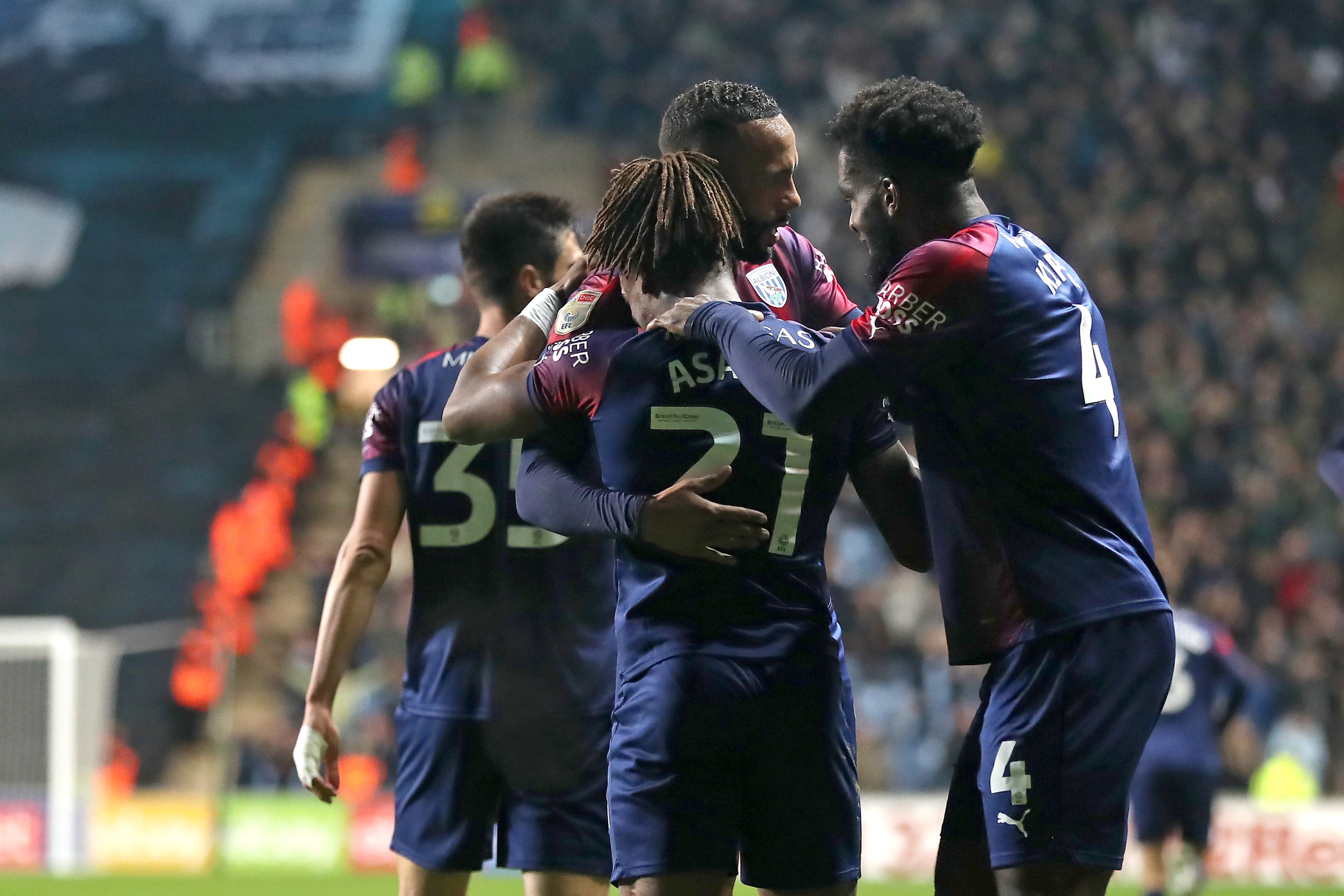 Brandon Thomas-Asante celebrates scoring against Coventry City with his team-mates