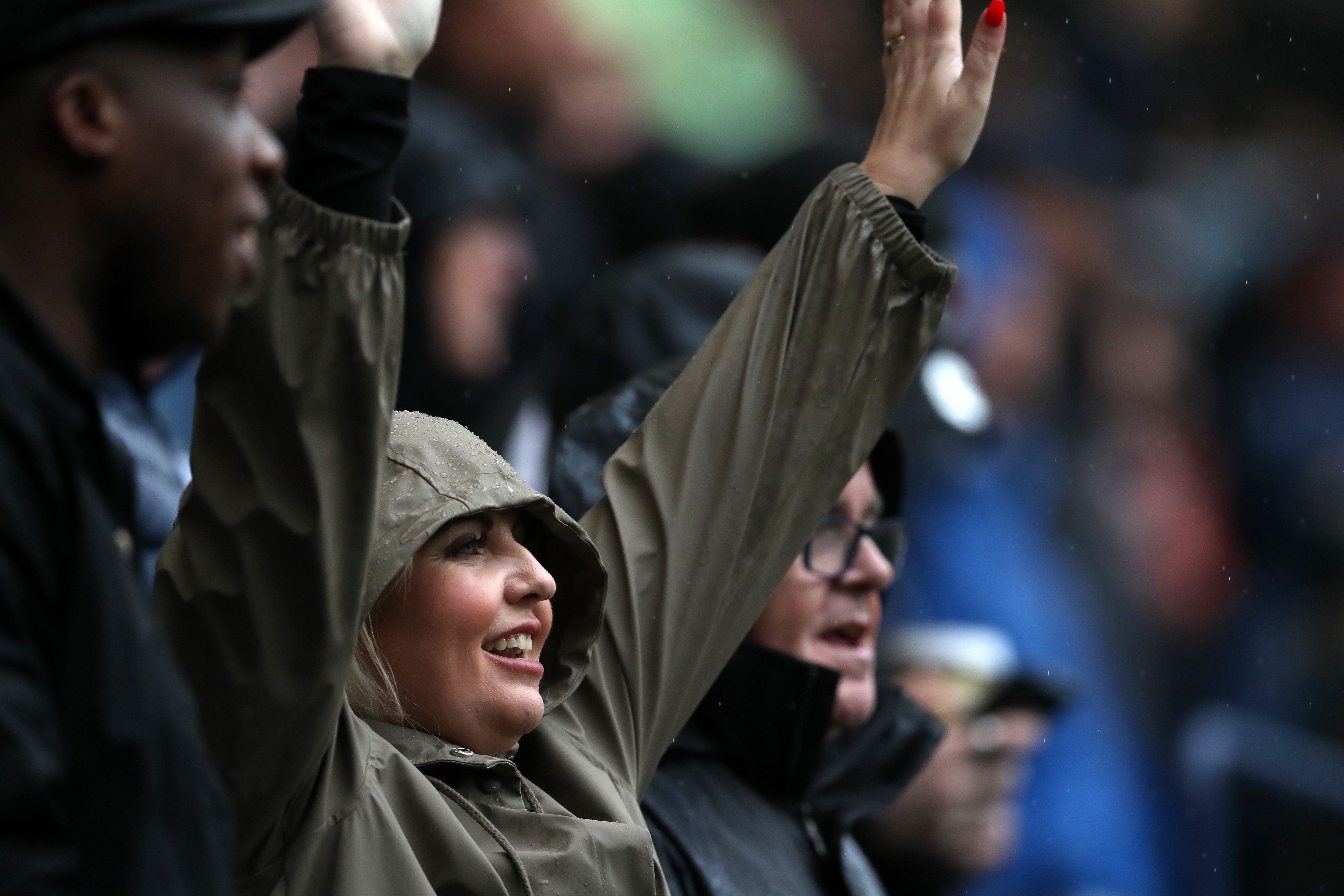 A female Albion fan cheering