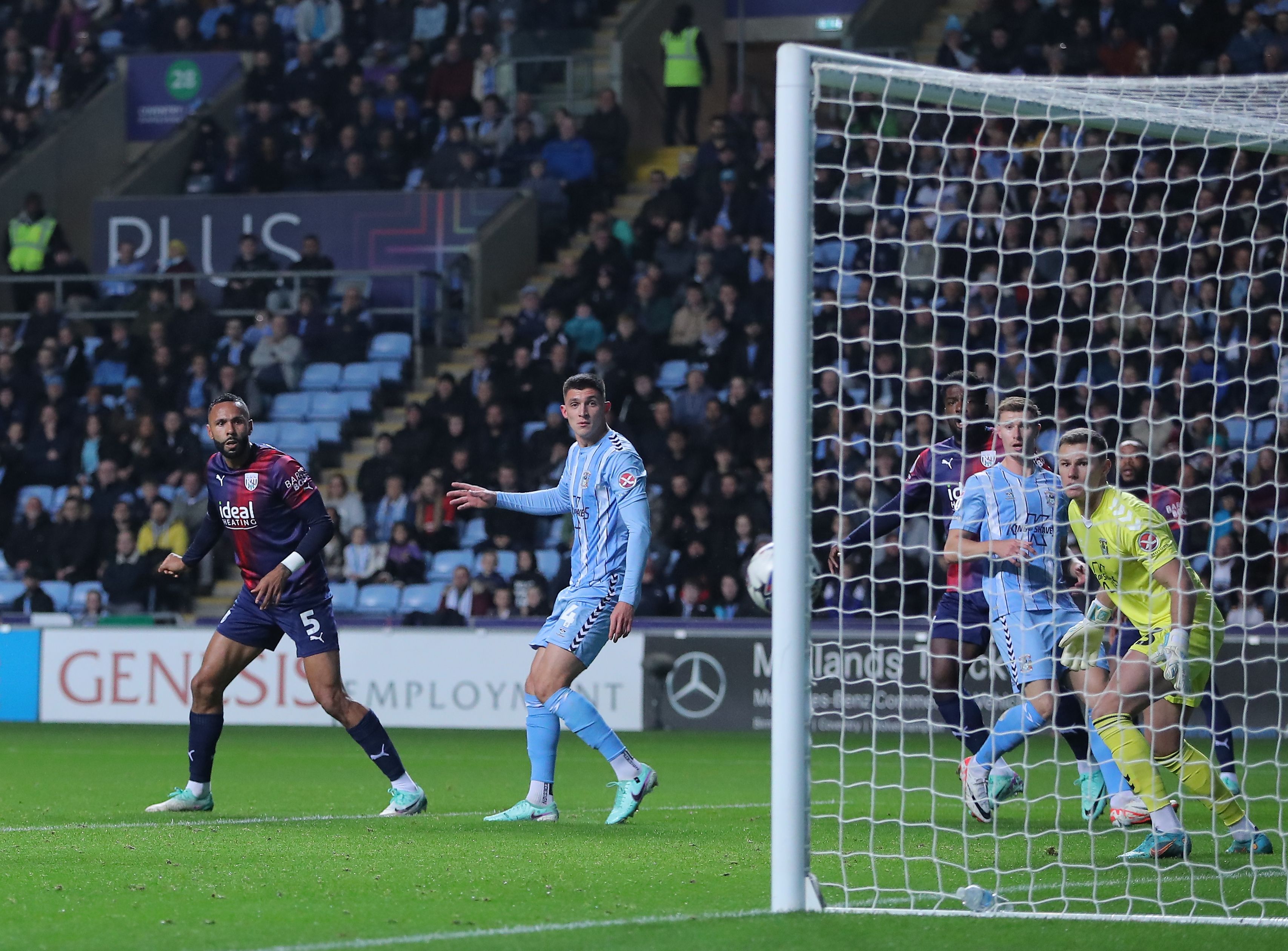 Kyle Bartley heads the ball against the post against Coventry