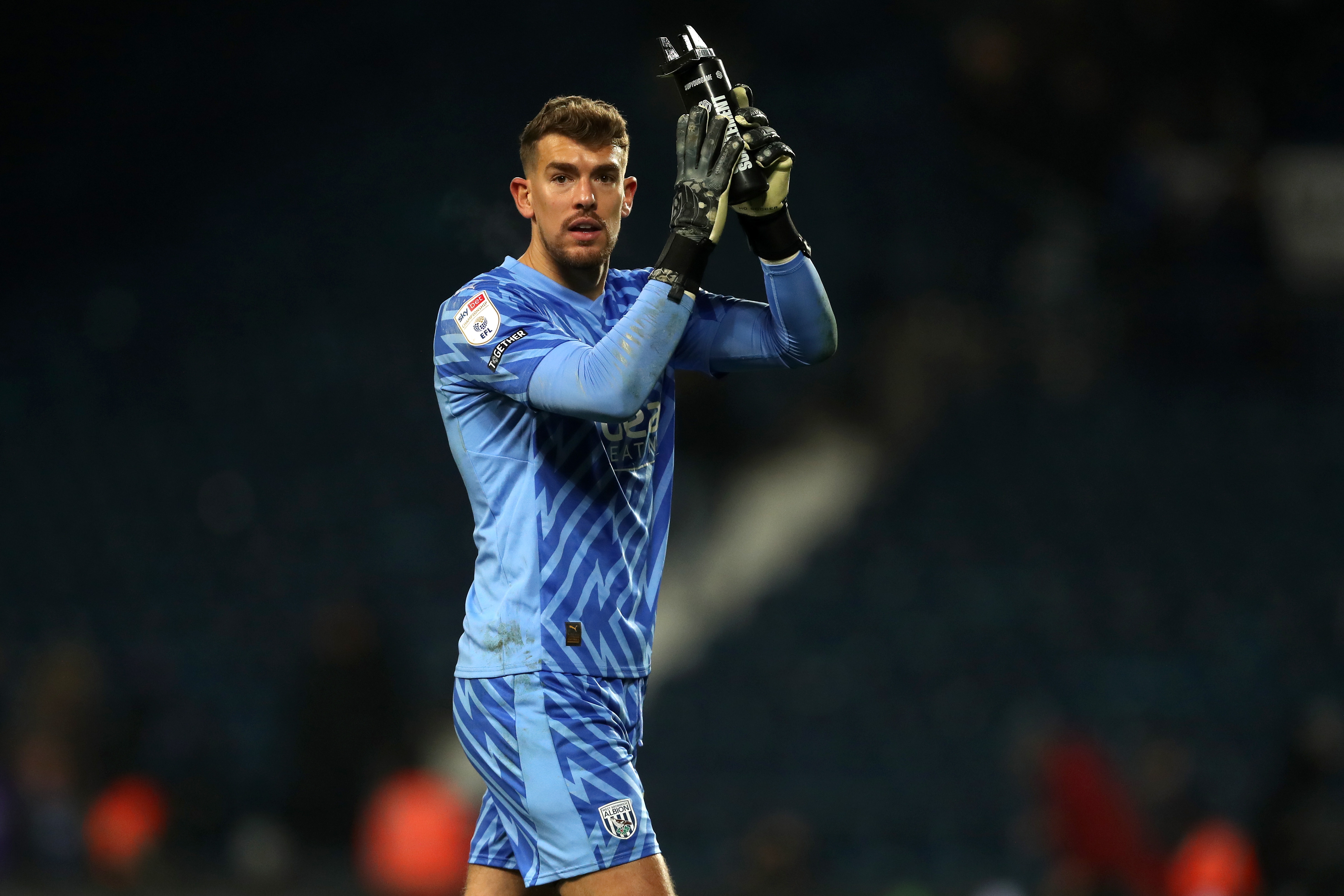 Alex Palmer applauds supporters at full-time against Ipswich 