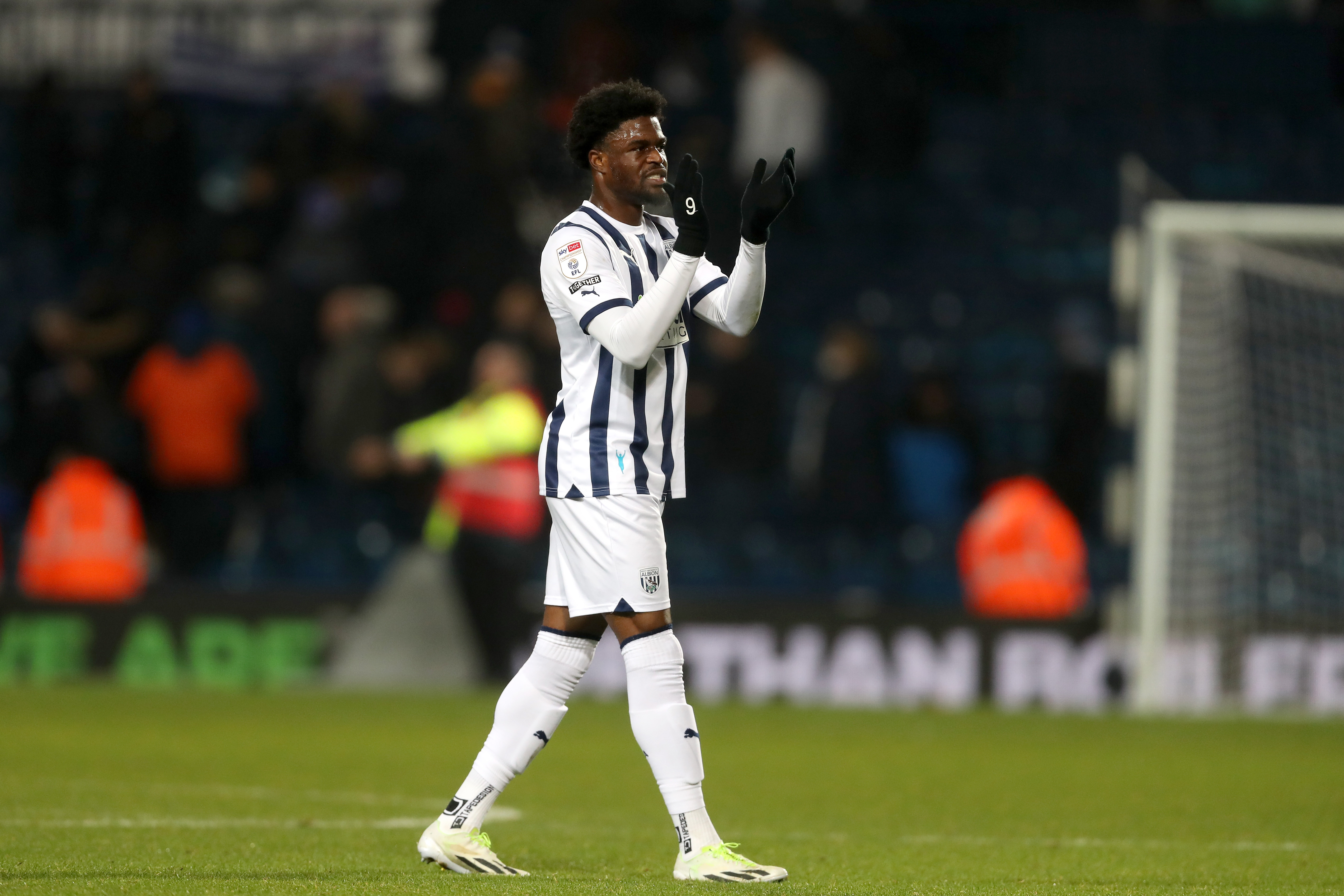Josh Maja applauds supporters at full-time against Ipswich 