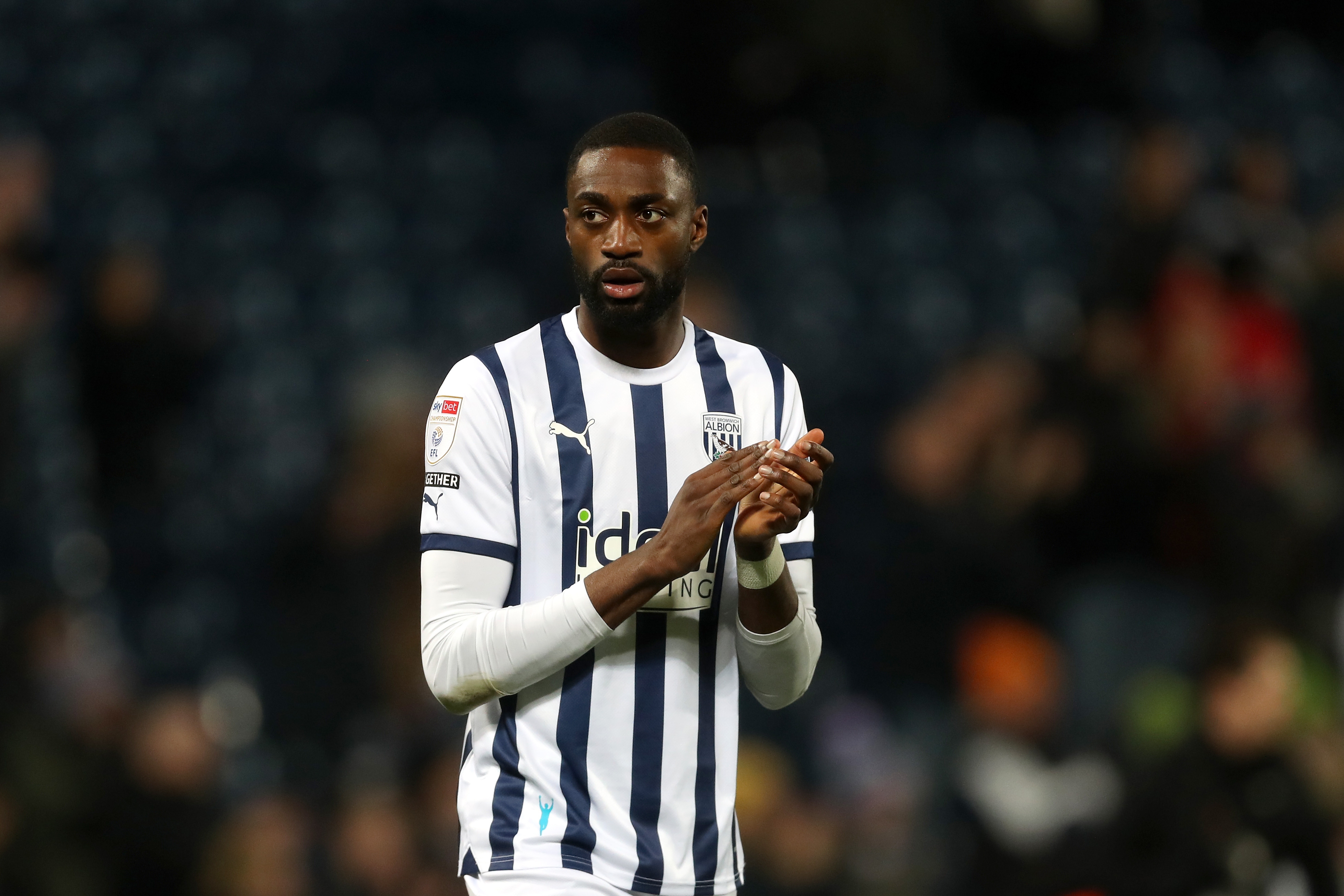 Semi Ajayi applauds supporters at full-time against Ipswich 