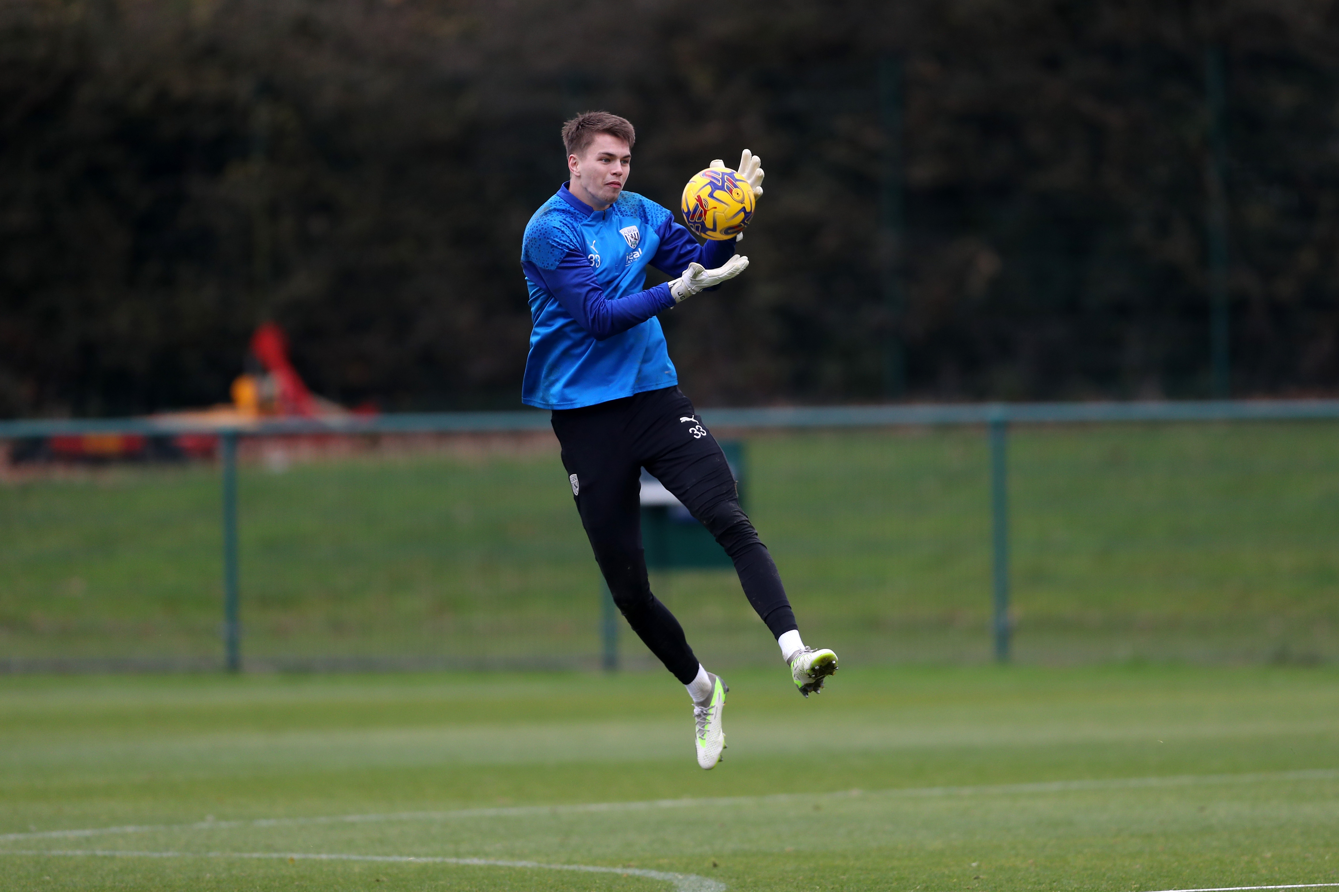 Josh Griffiths catching the ball in training 