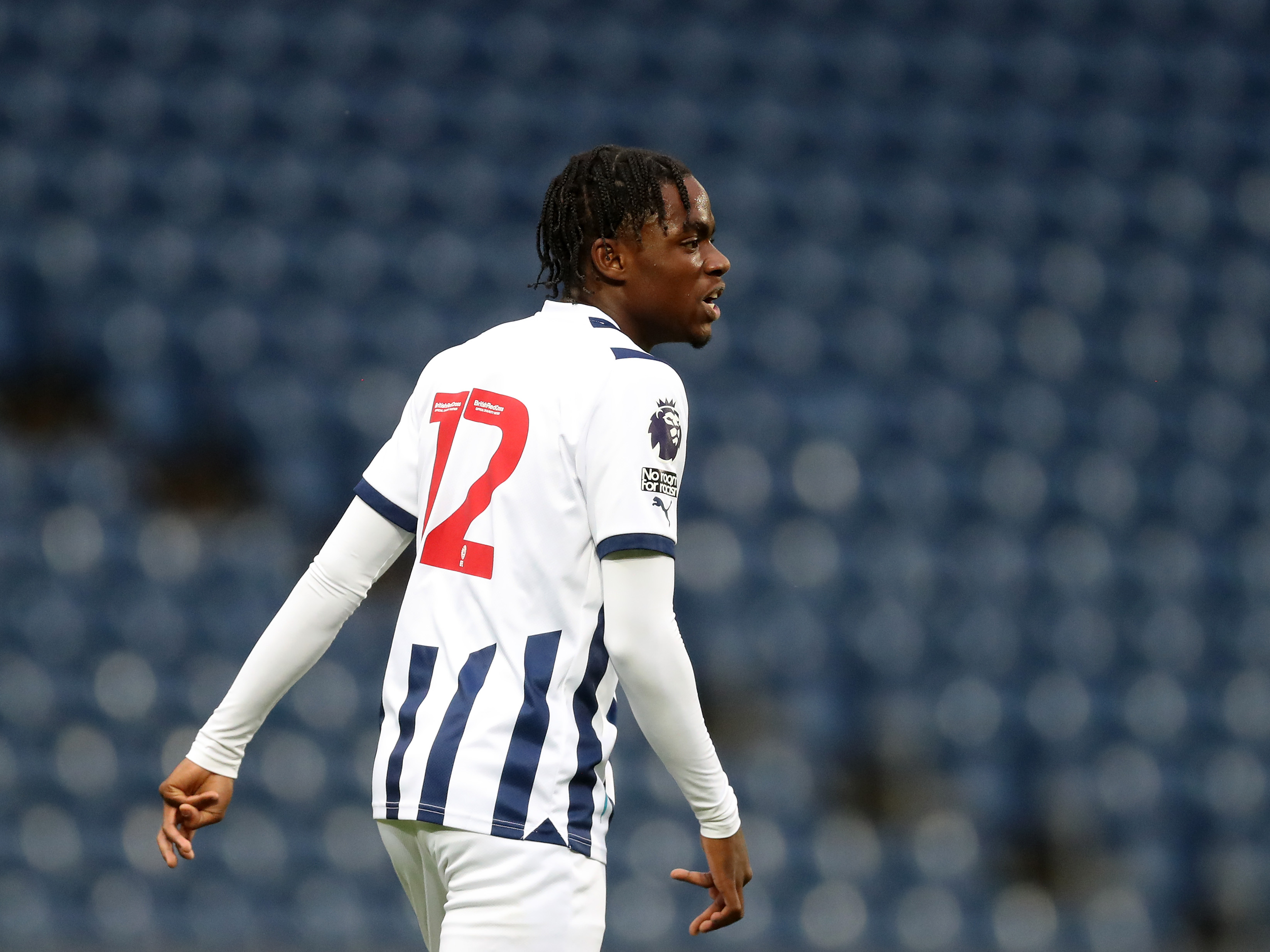 A photo of Albion academy product Akeel Higgins in action at The Hawthorns