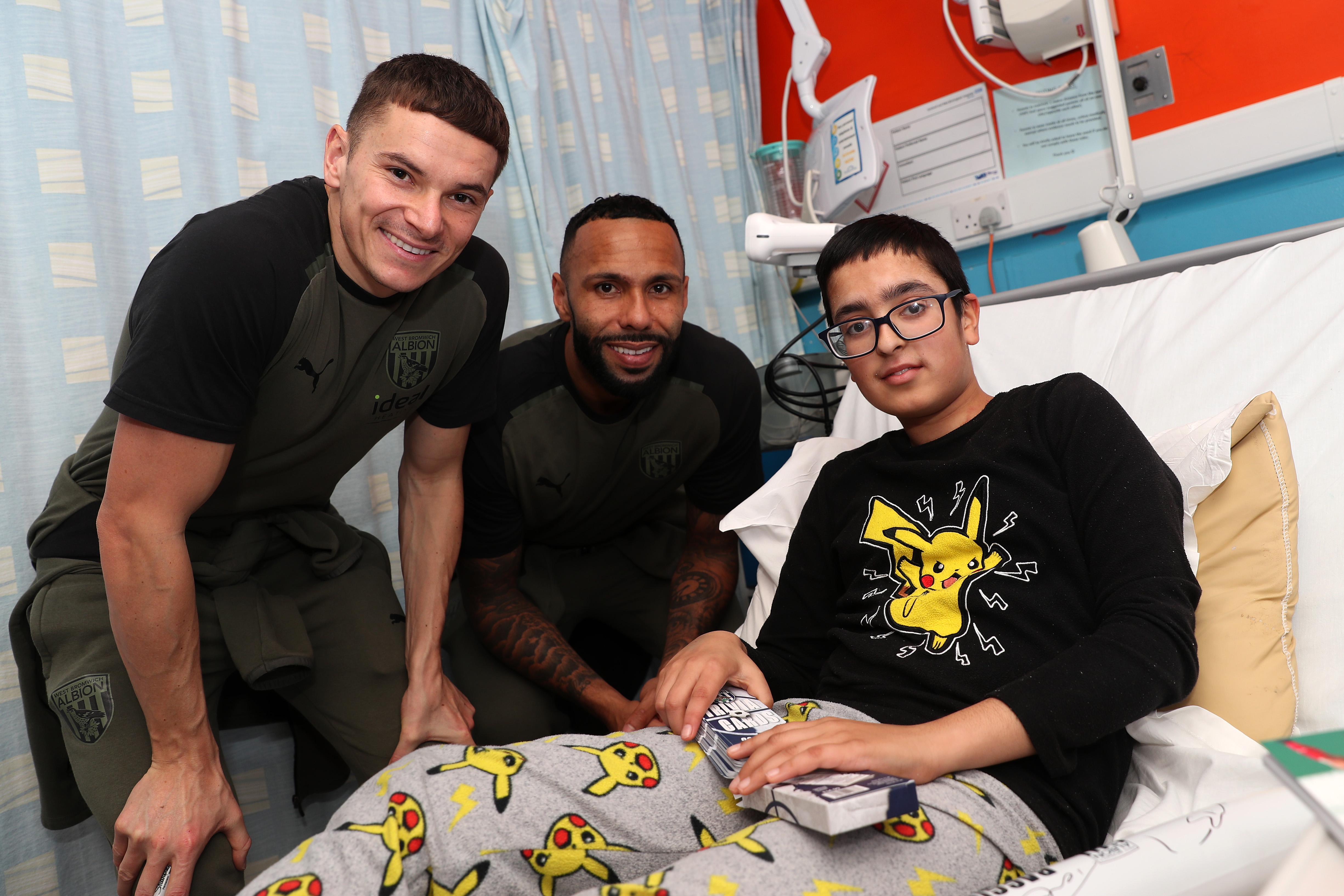 Conor Townsend and Kyle Bartley pose for a photo with patients at Sandwell General Hospital