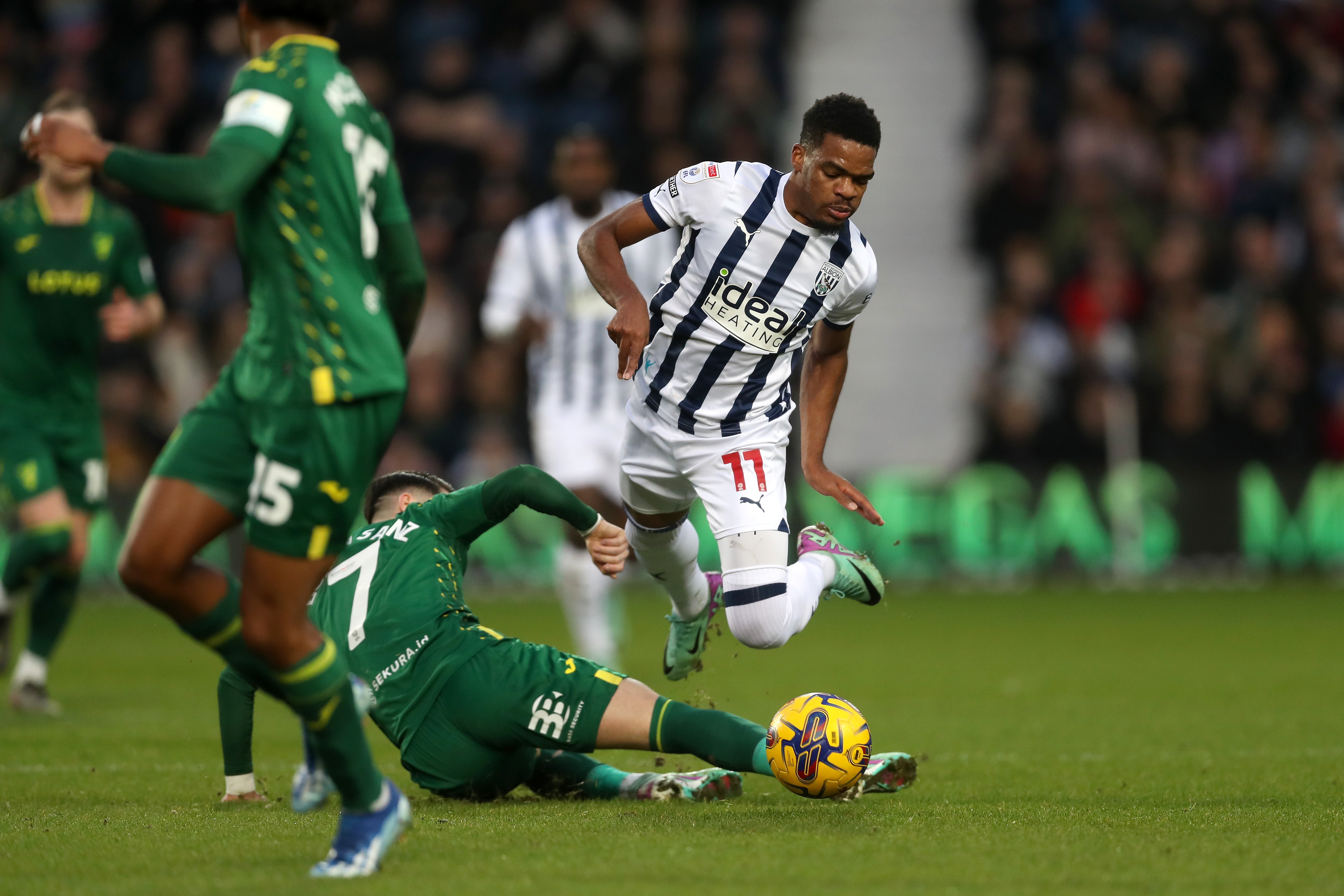 Grady Diangana is fouled by a Norwich City player