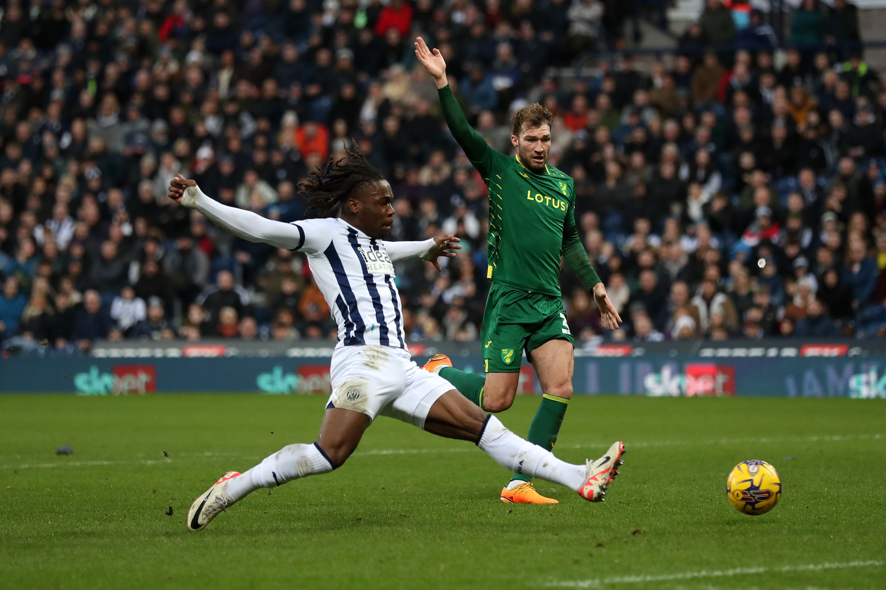 Brandon Thomas-Asante stretches for the ball against Norwich