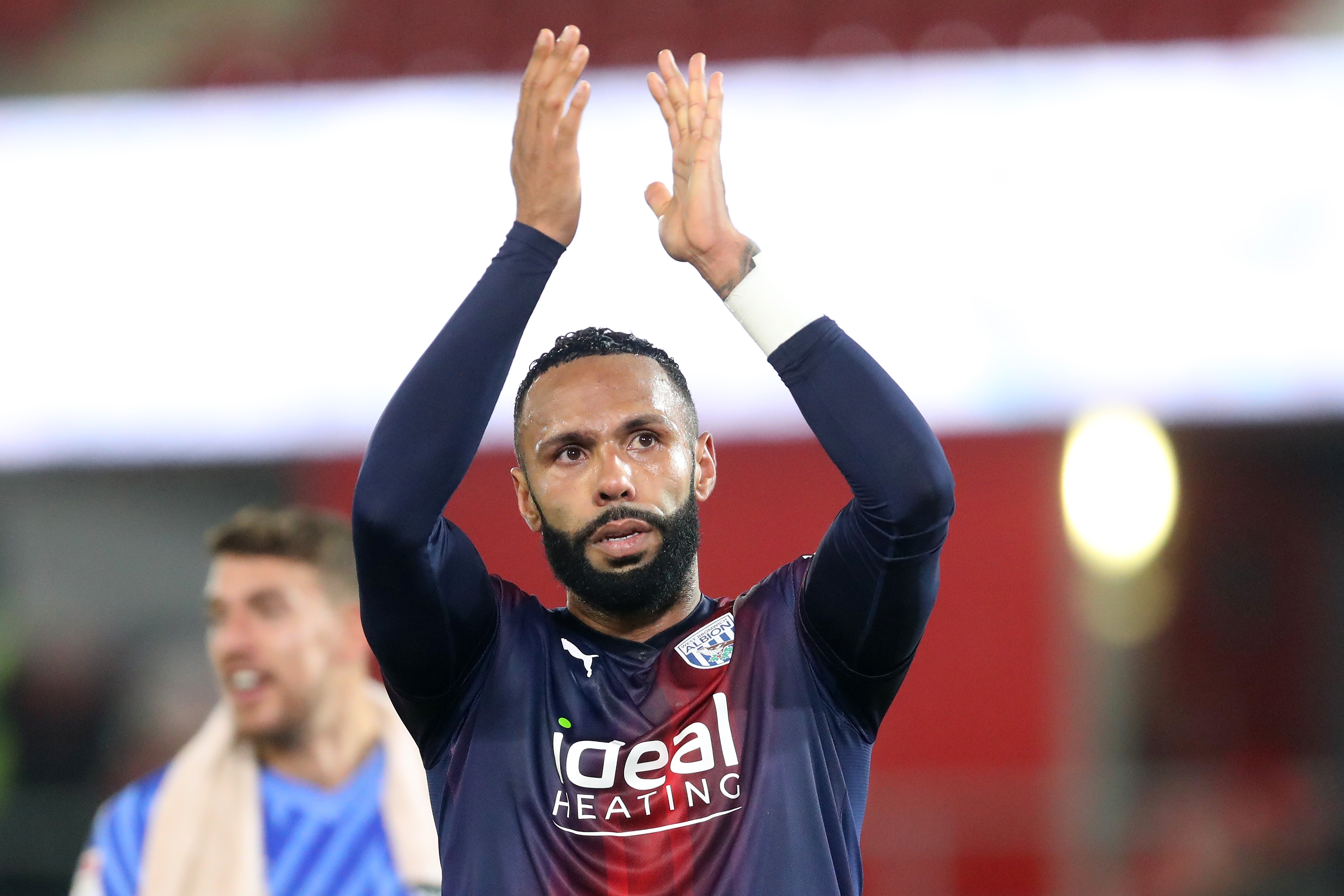 Kyle Bartley applauds Albion fans after the match