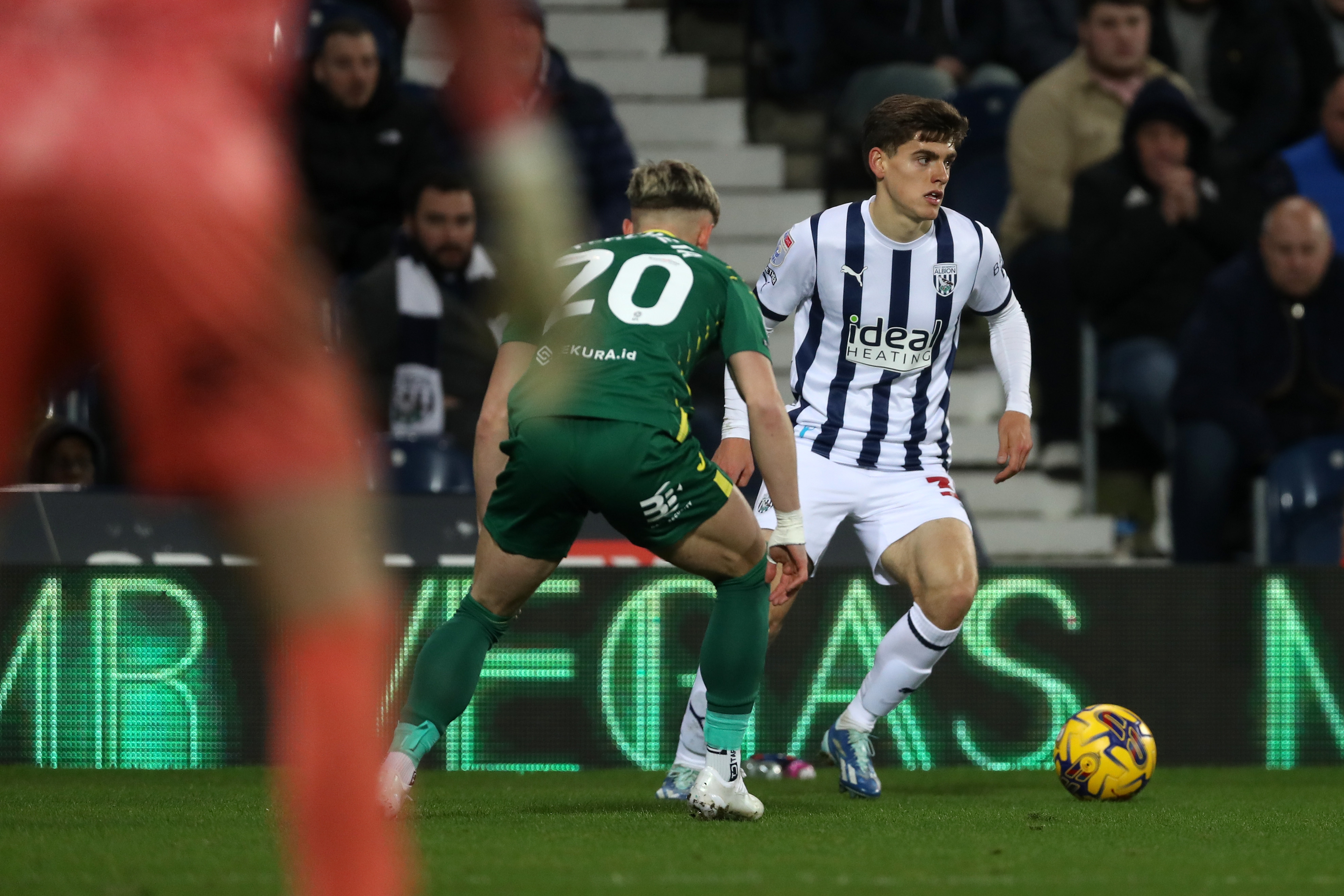 Tom Fellows on the ball against Norwich