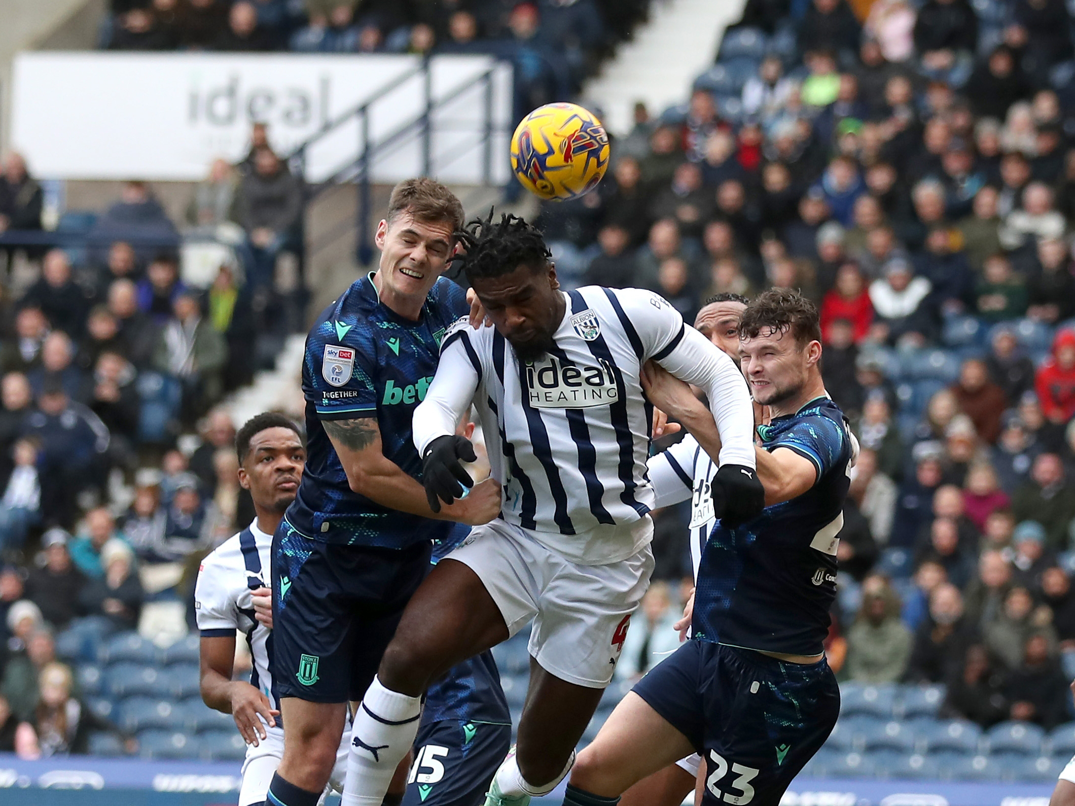 Cedric Kipre jumps for the ball against Stoke