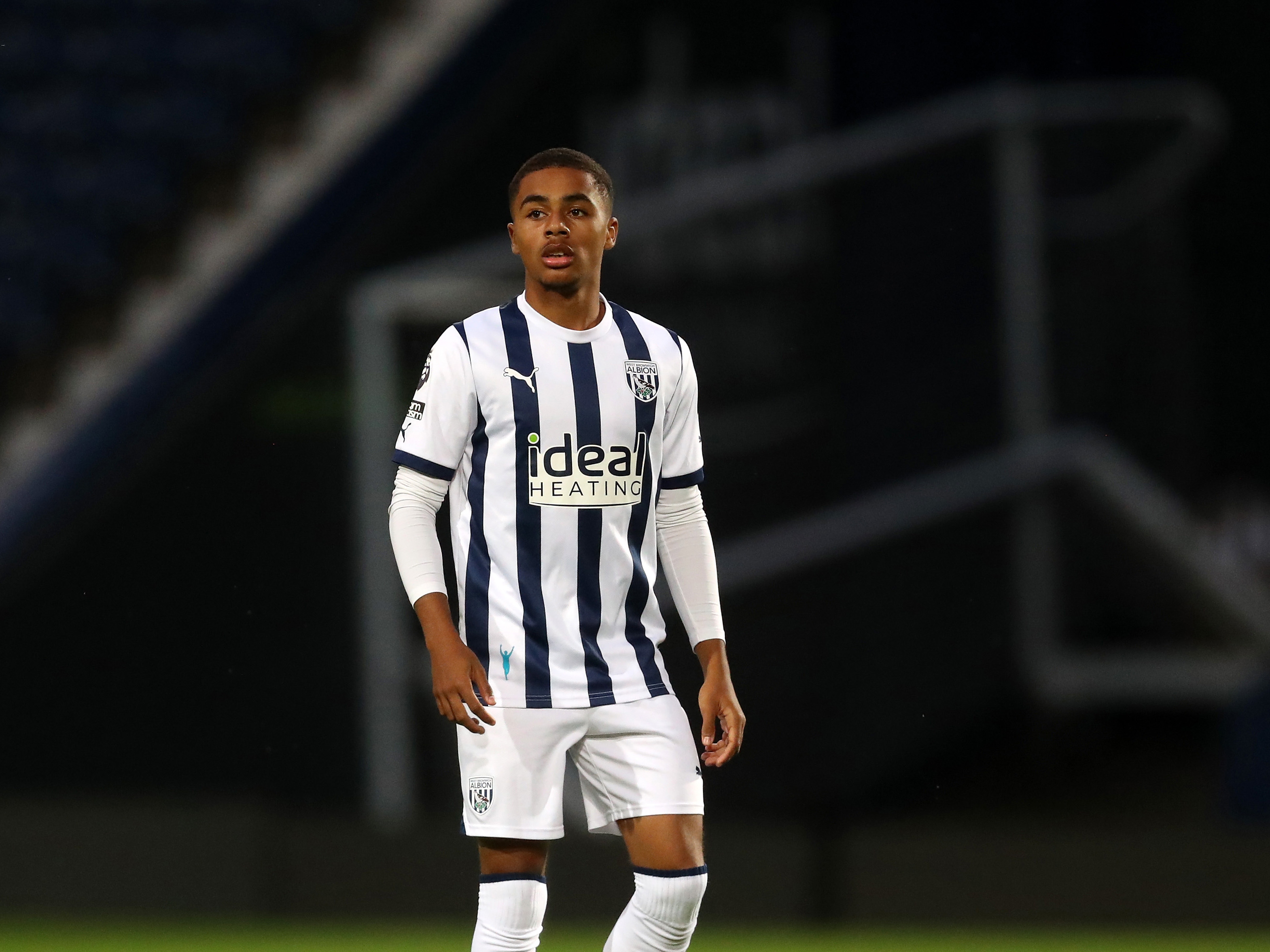 A photo of Albion U18s defender Deago Nelson in action for the PL2 team at The Hawthorns in the 2023/24 home colours