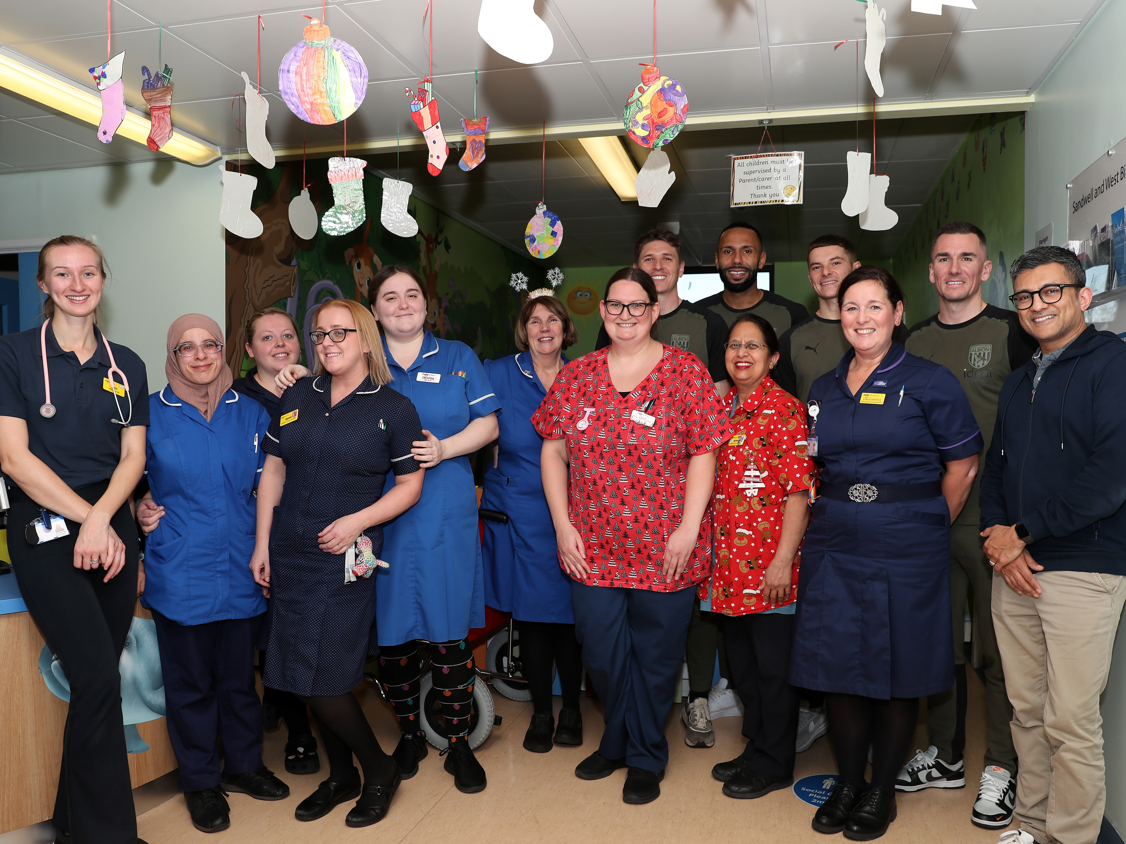 An image of Jed Wallace, Kyle Bartley, Conor Townsend & Adam Reach with staff at Sandwell General Hospital