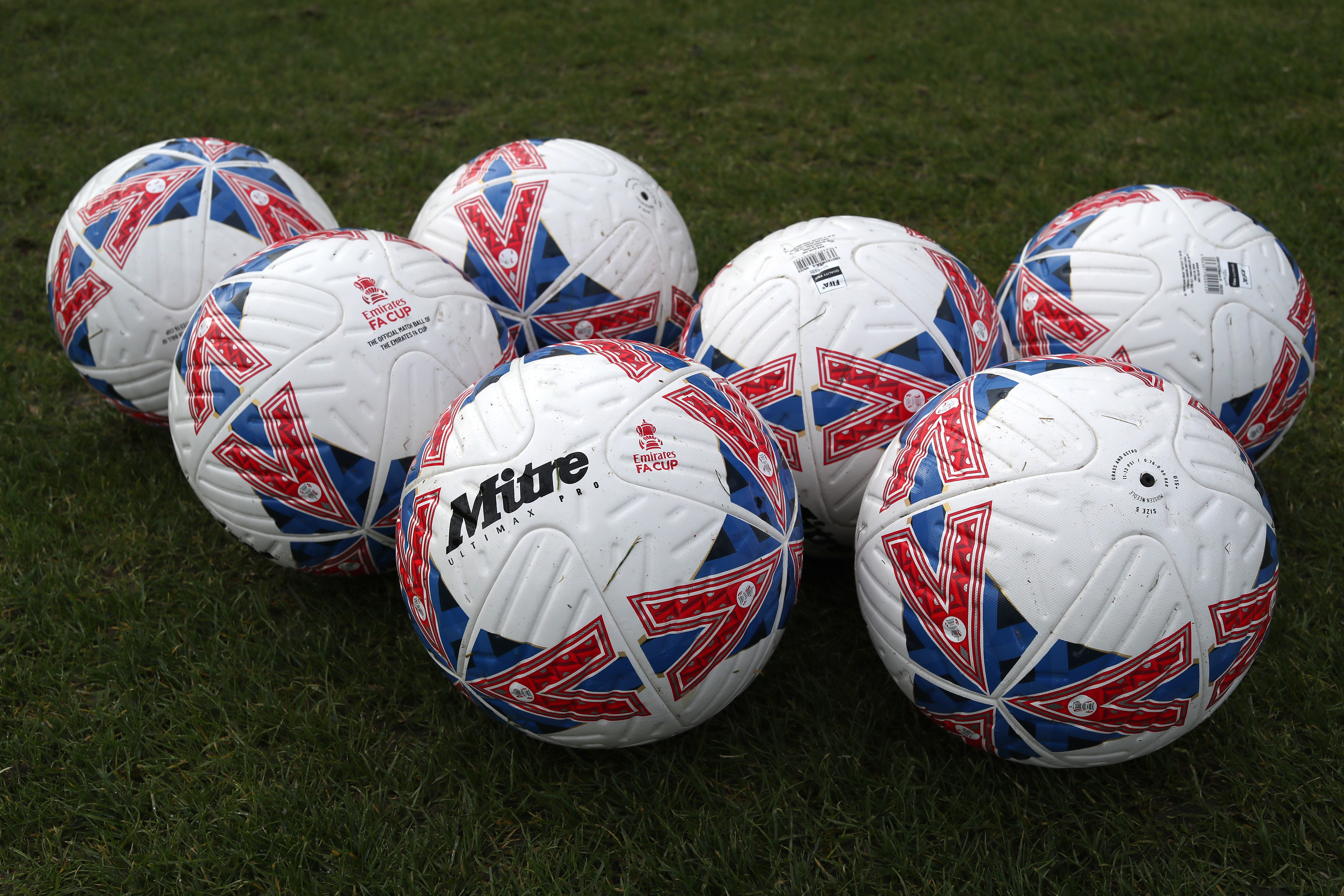 Mitre FA Cup footballs on the training pitch